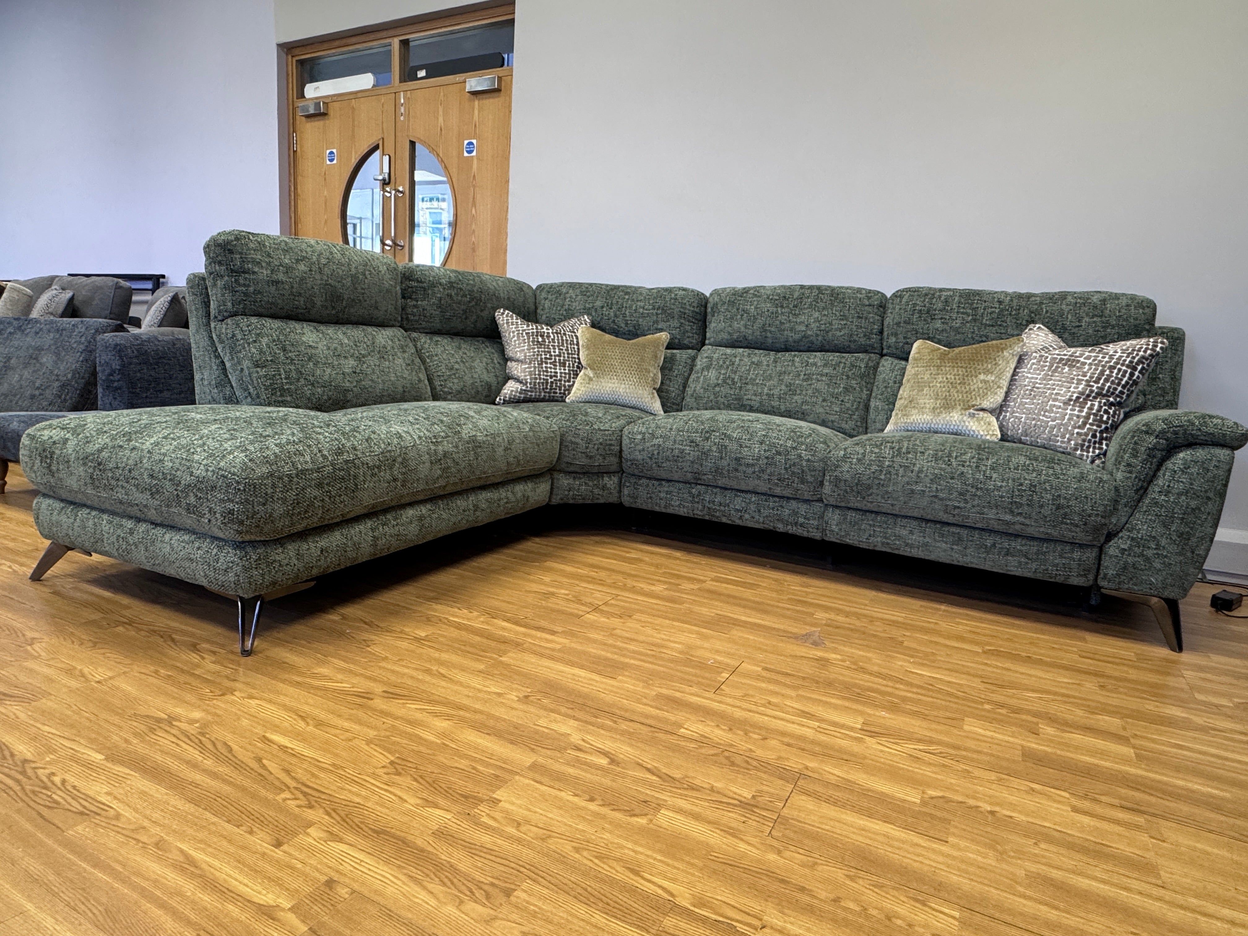 Contempo Left facing Electric reclining corner sofa & matching reclining chair in green chenille basket weave fabric