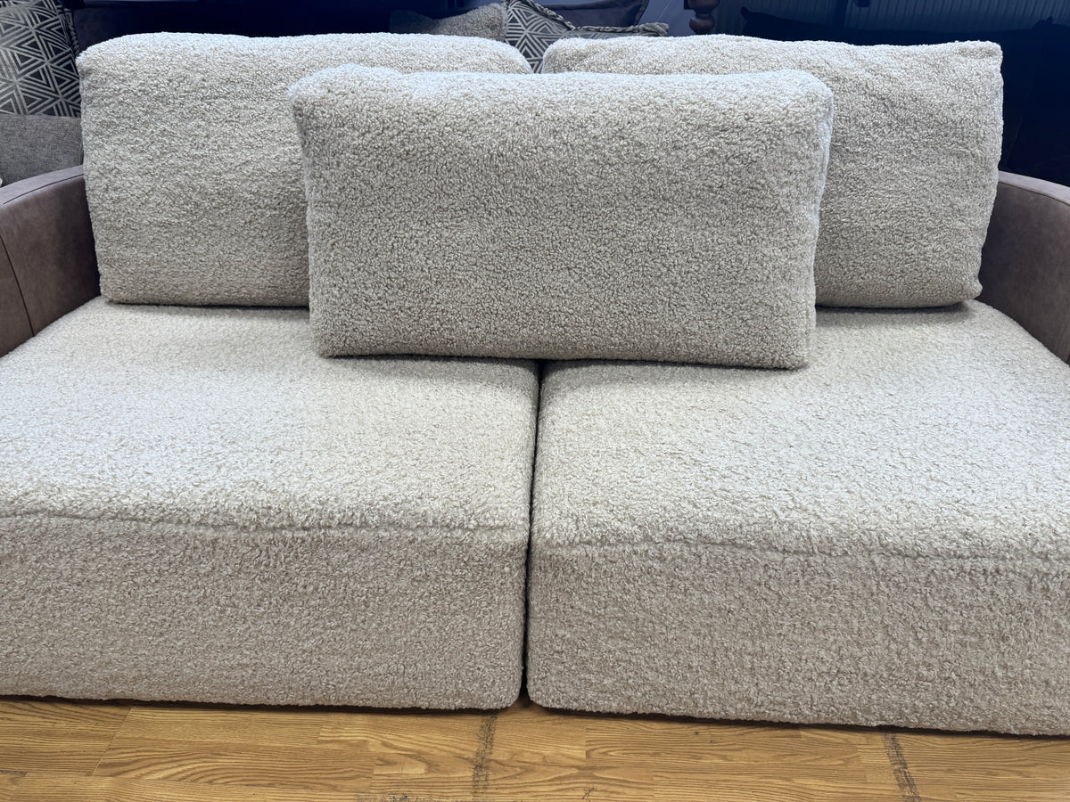 Proto 4 seater split sofa in half faux tan leather and cream borg fabric