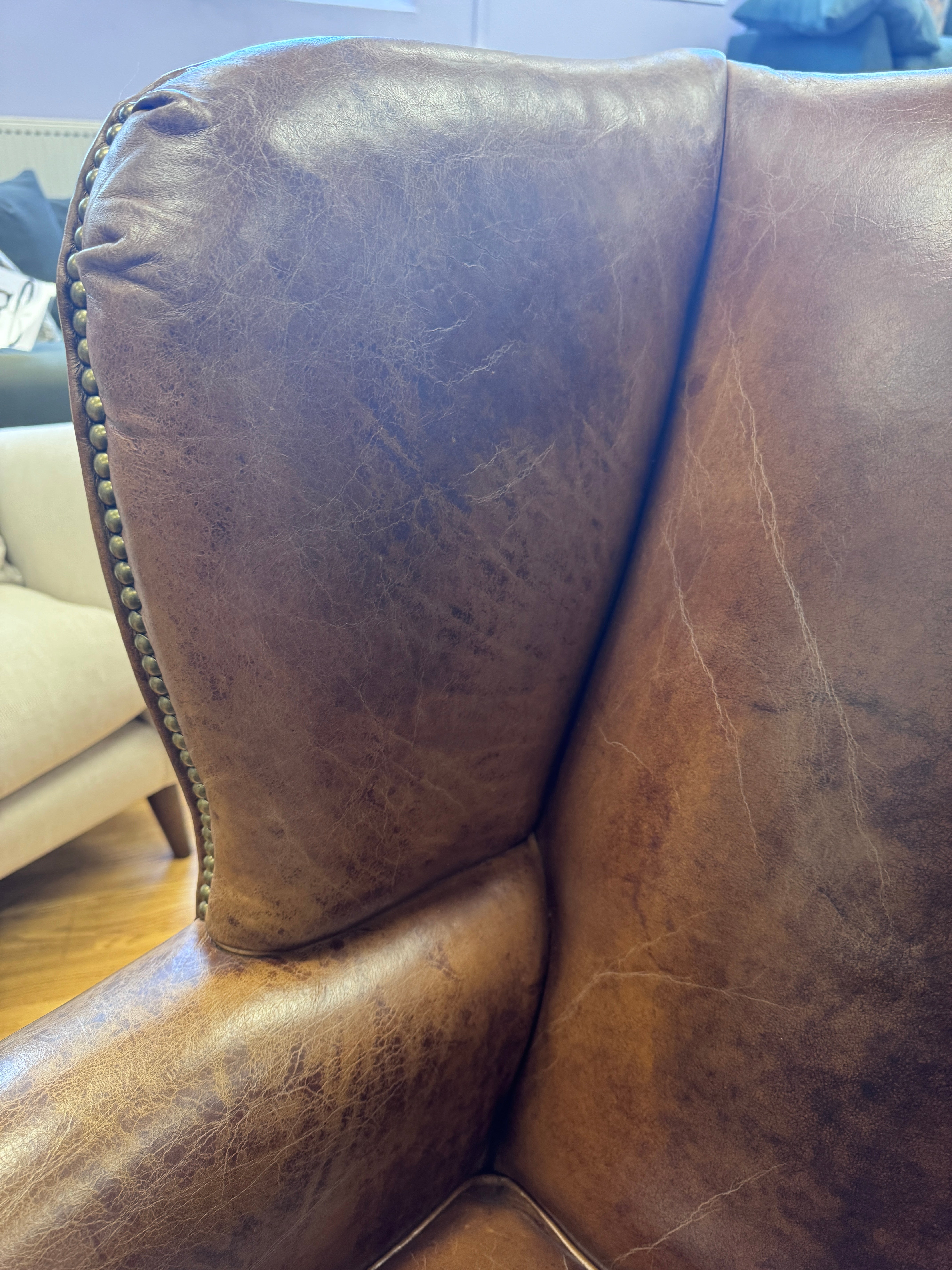 Halo wingback armchair in Cognac leather