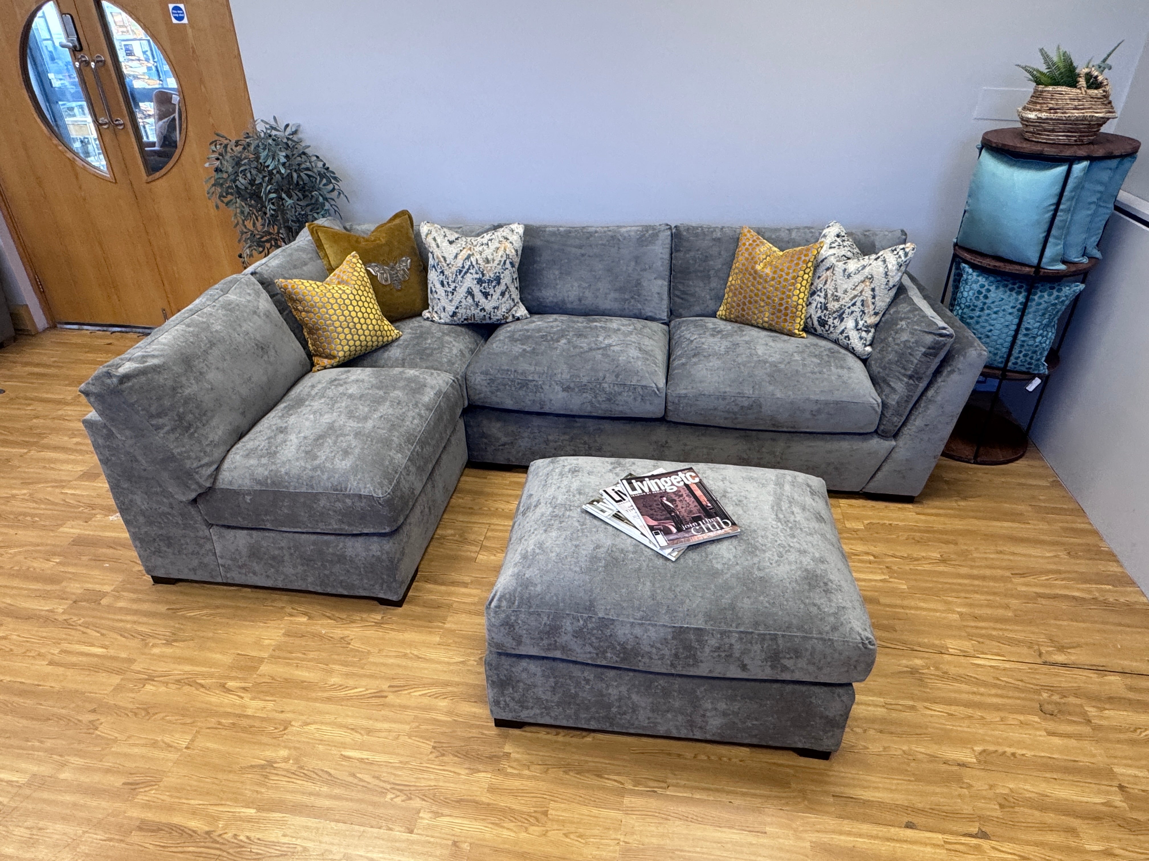 Phoenix left facing corner chaise sofa with footstool in Kingston Grey fabric