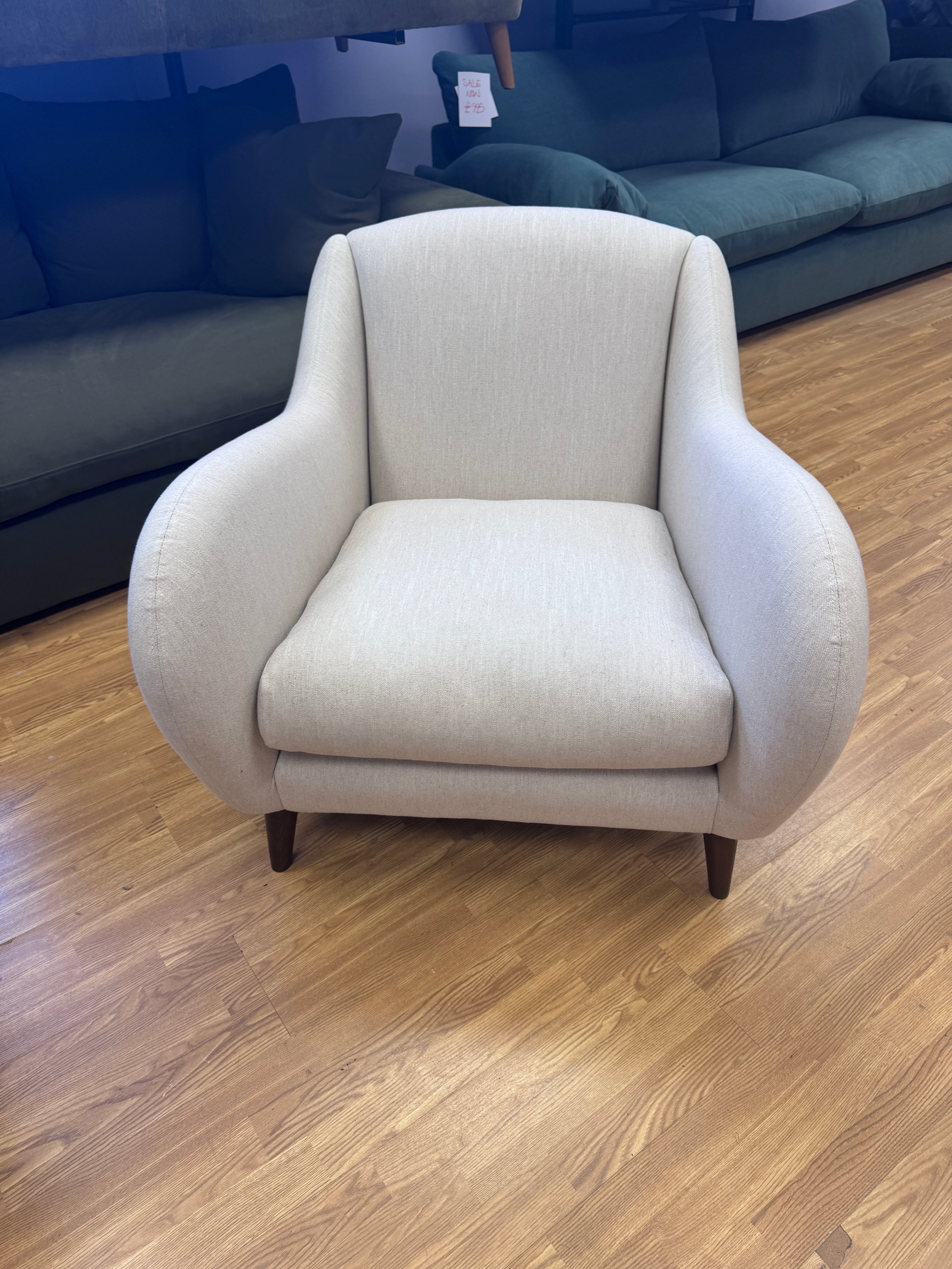 Sample fireside accent chair in Thatch house fabric