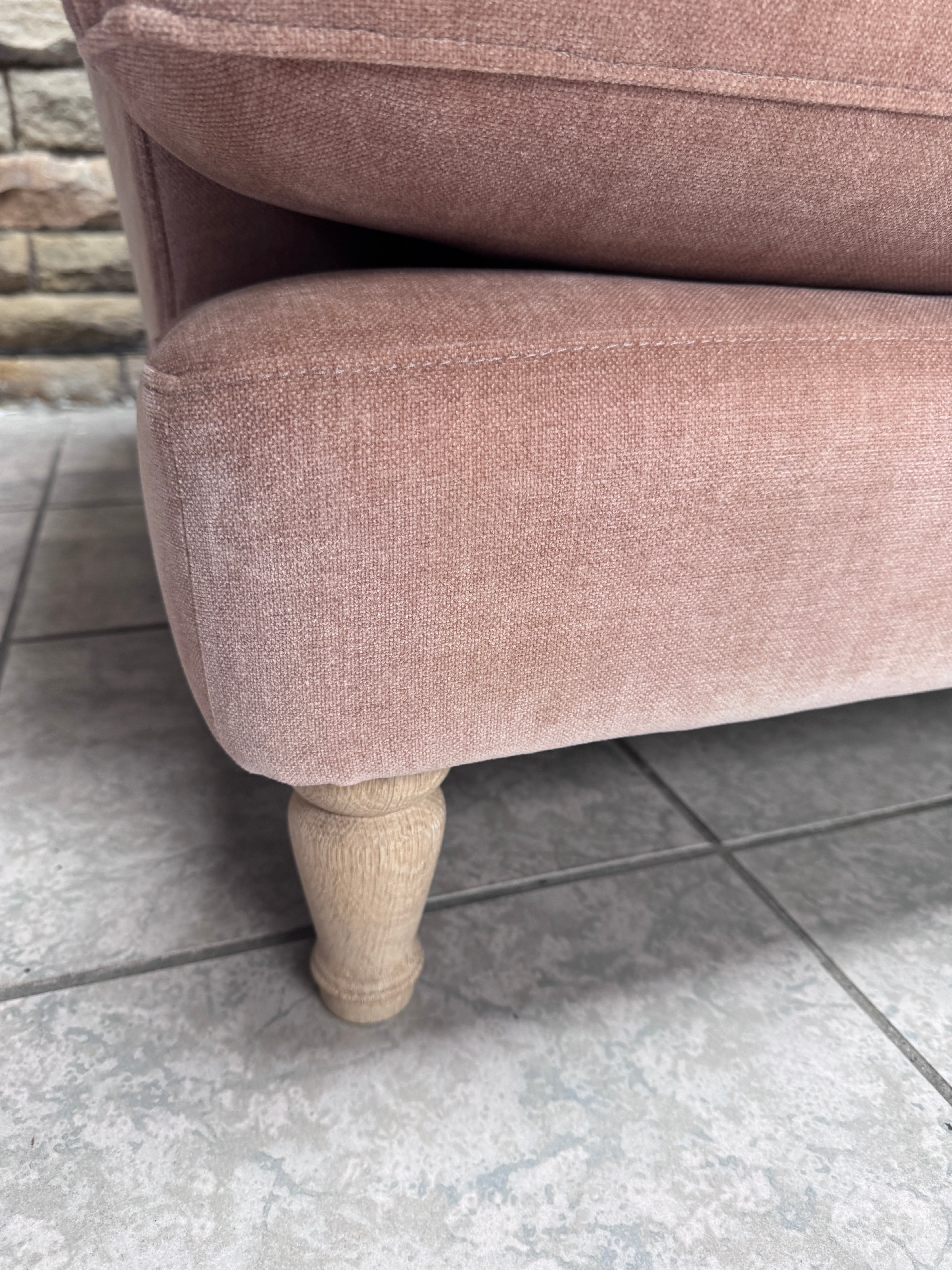 Iris loveseat with round arms in blush pink moleskin fabric