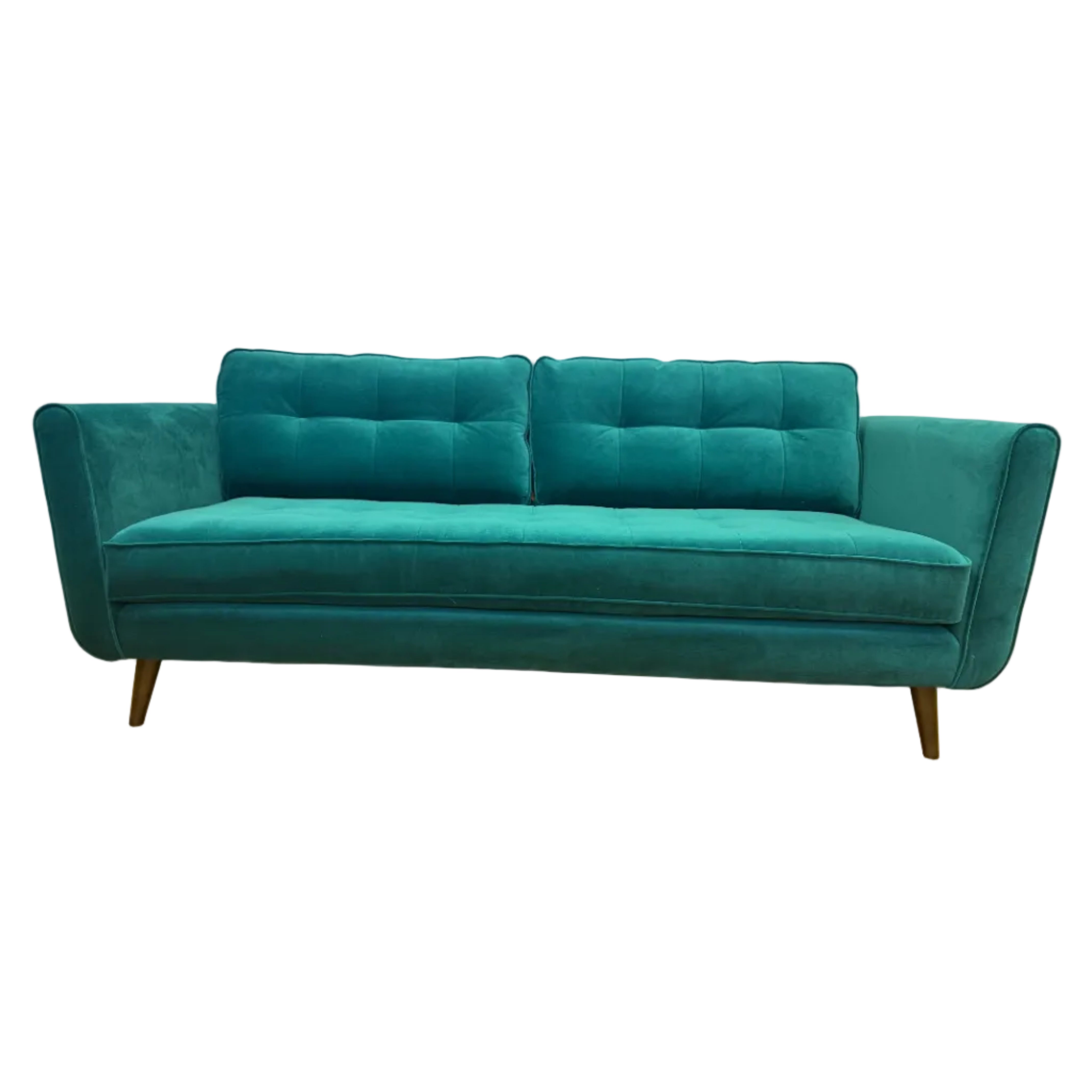 Teal sofa on a wooden floor with a white wall background