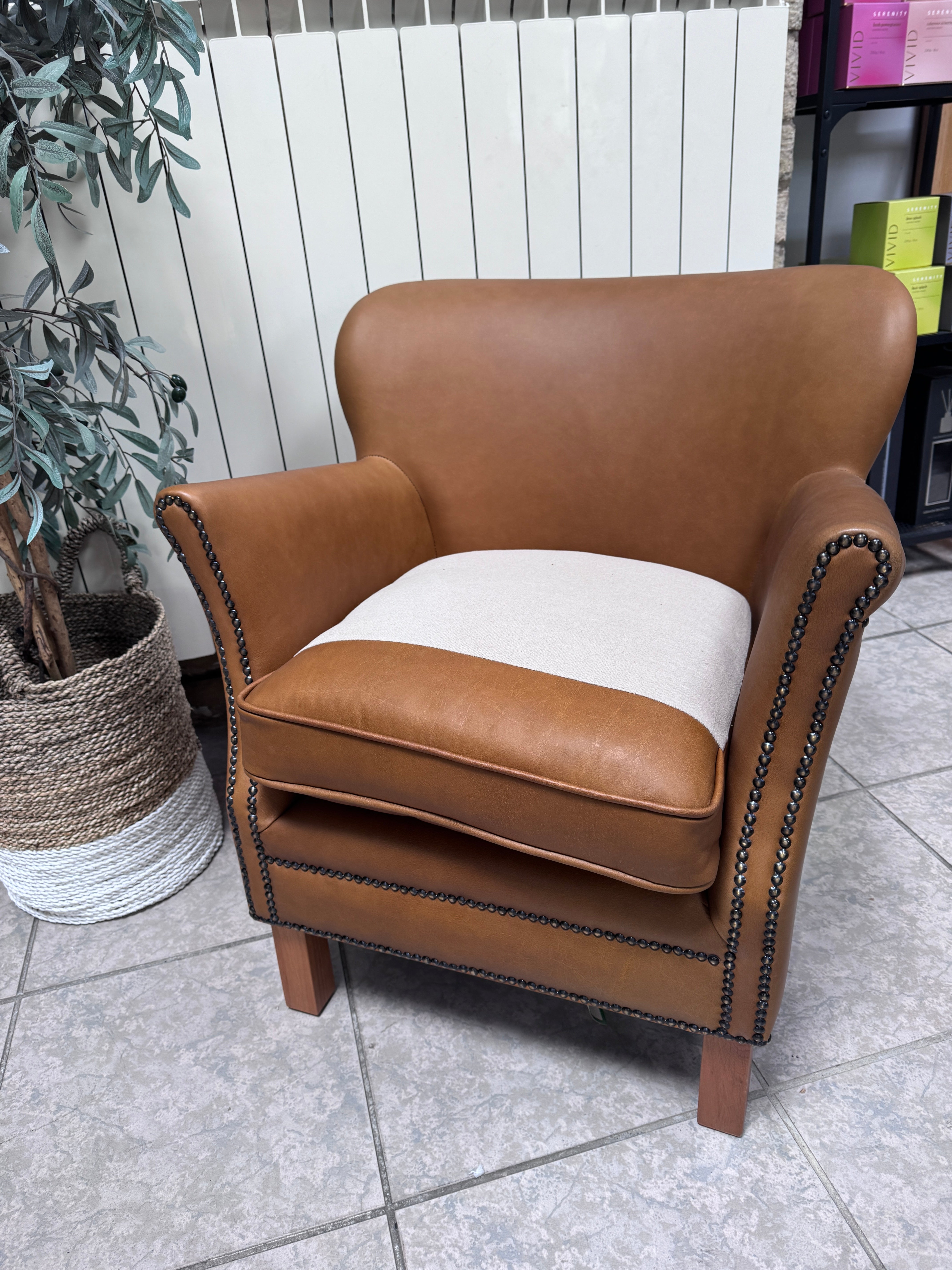 Adam accent chair in Tan brown leather with Natural linen reversible seat pad