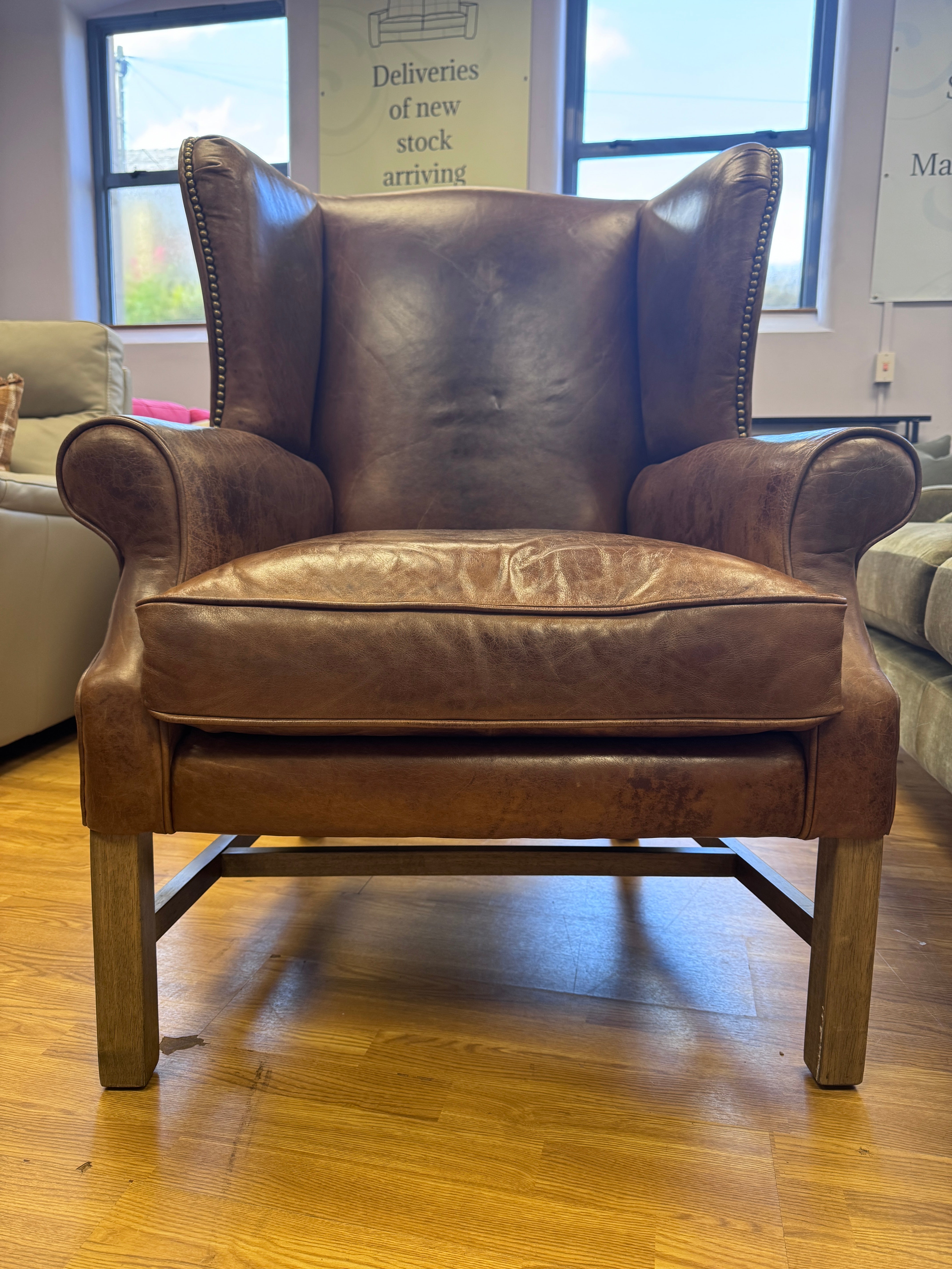 Halo wingback armchair in Cognac leather
