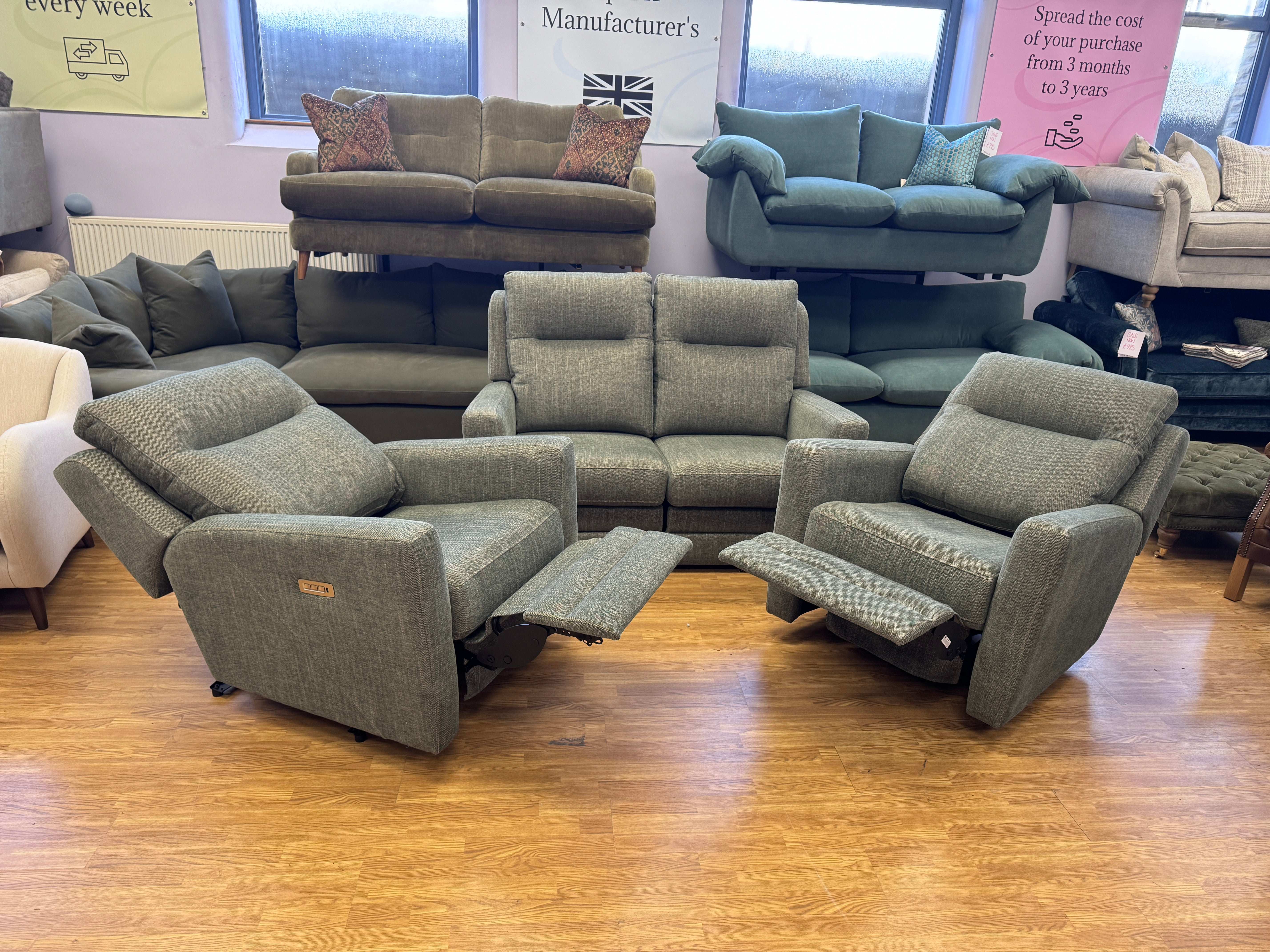 Parker Knoll Chicago electric reclining armchair with lumbar support in Green herringbone fabric