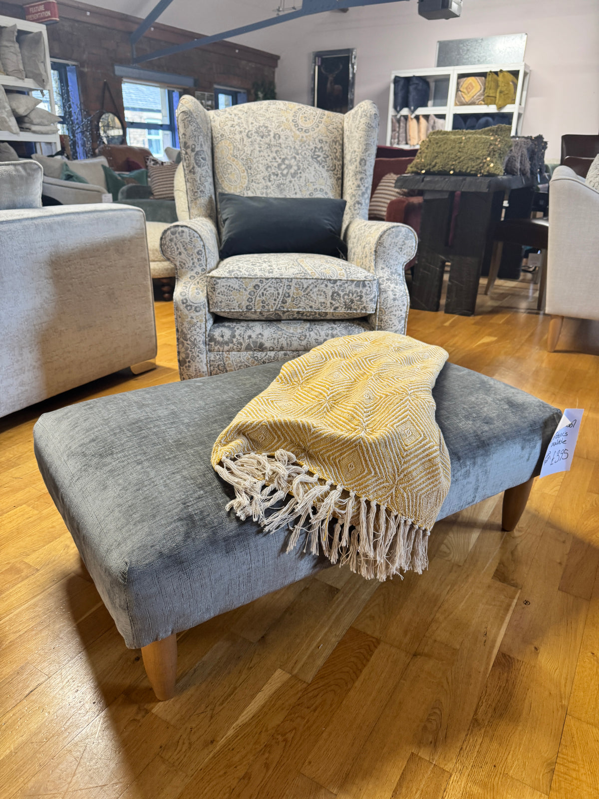 Heather wingback accent chair in grey / ochre Paisley print fabric