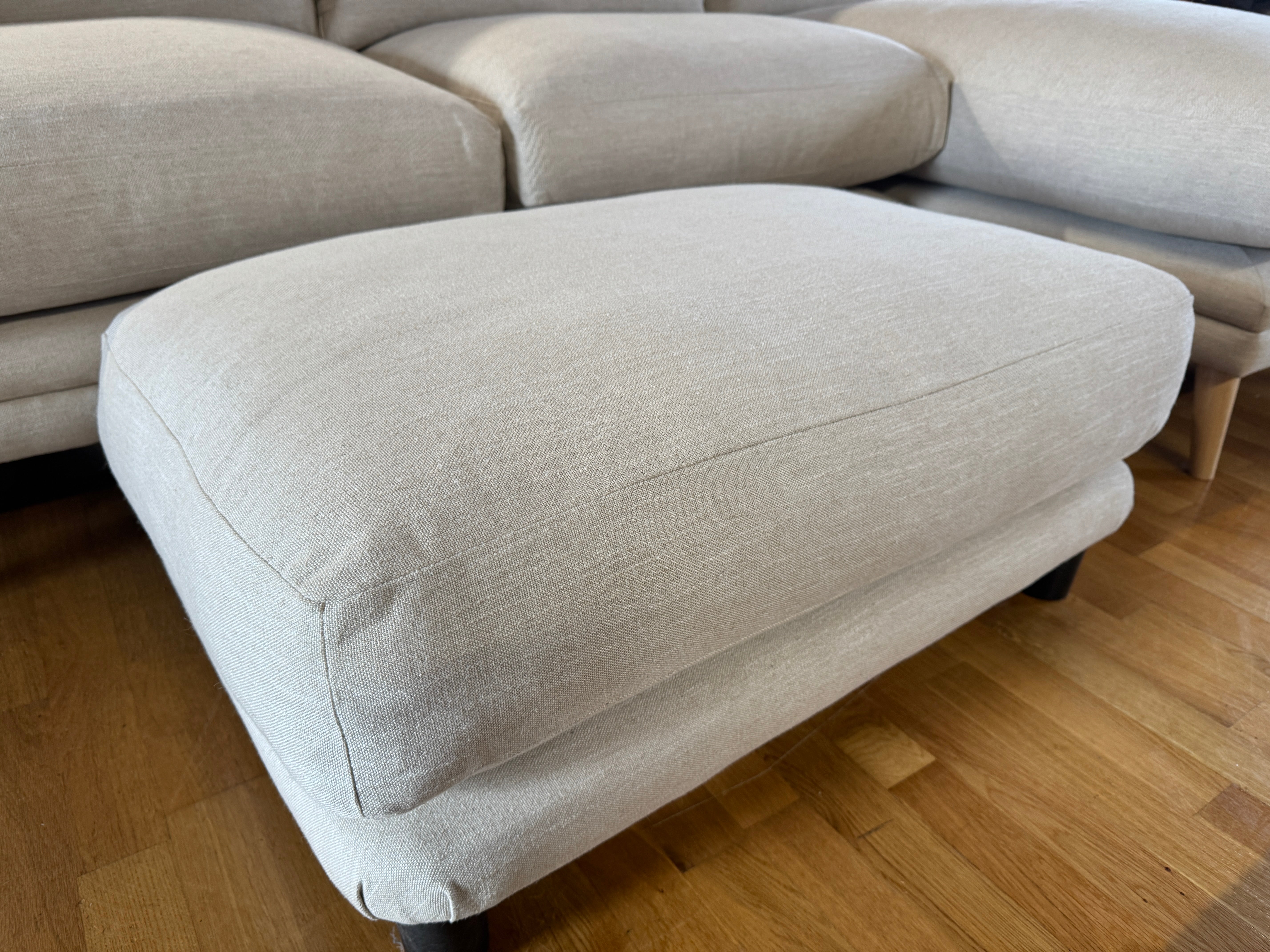 Loaf padded top footstool in clever vintage linen