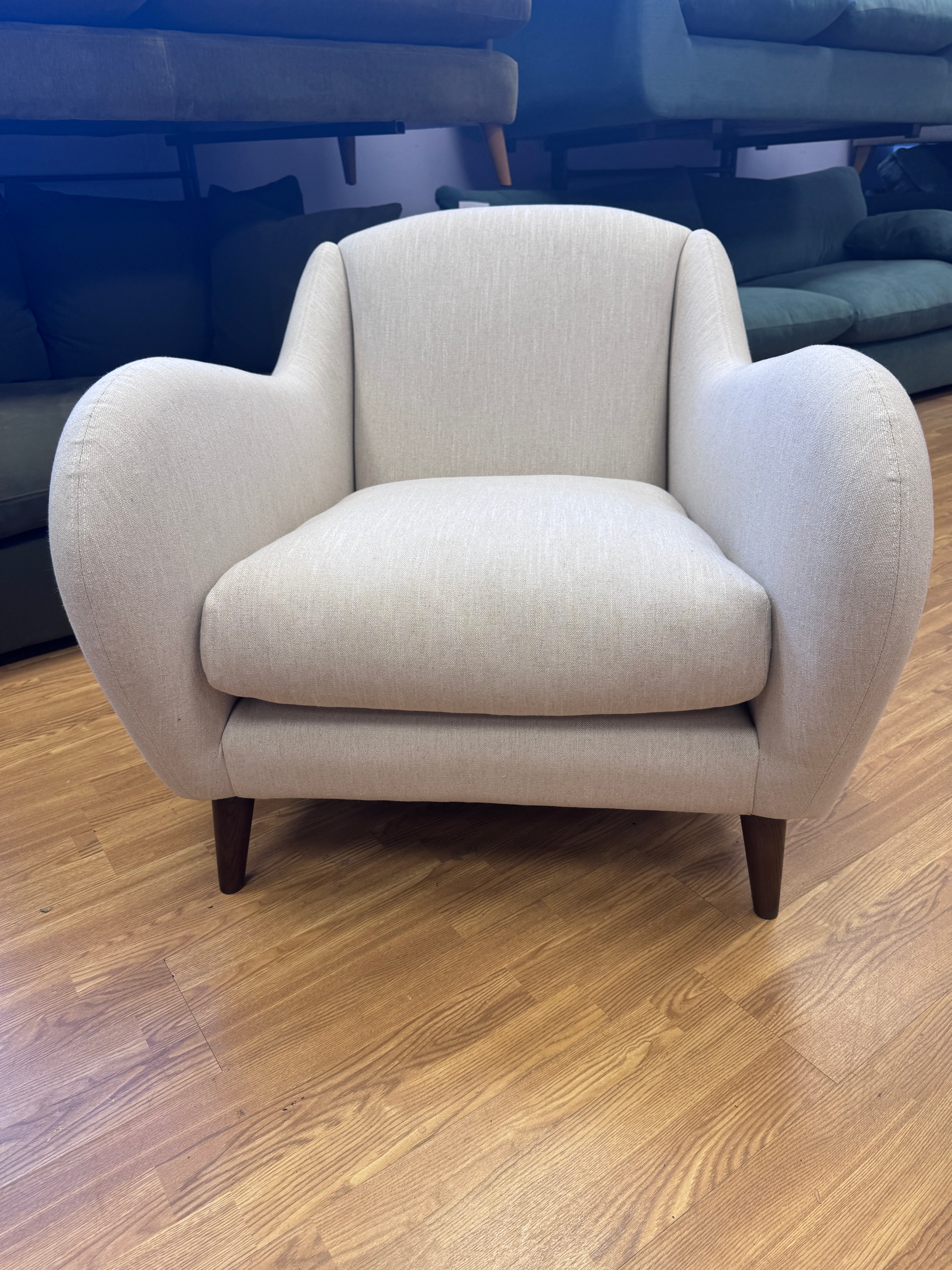 Sample fireside accent chair in Thatch house fabric