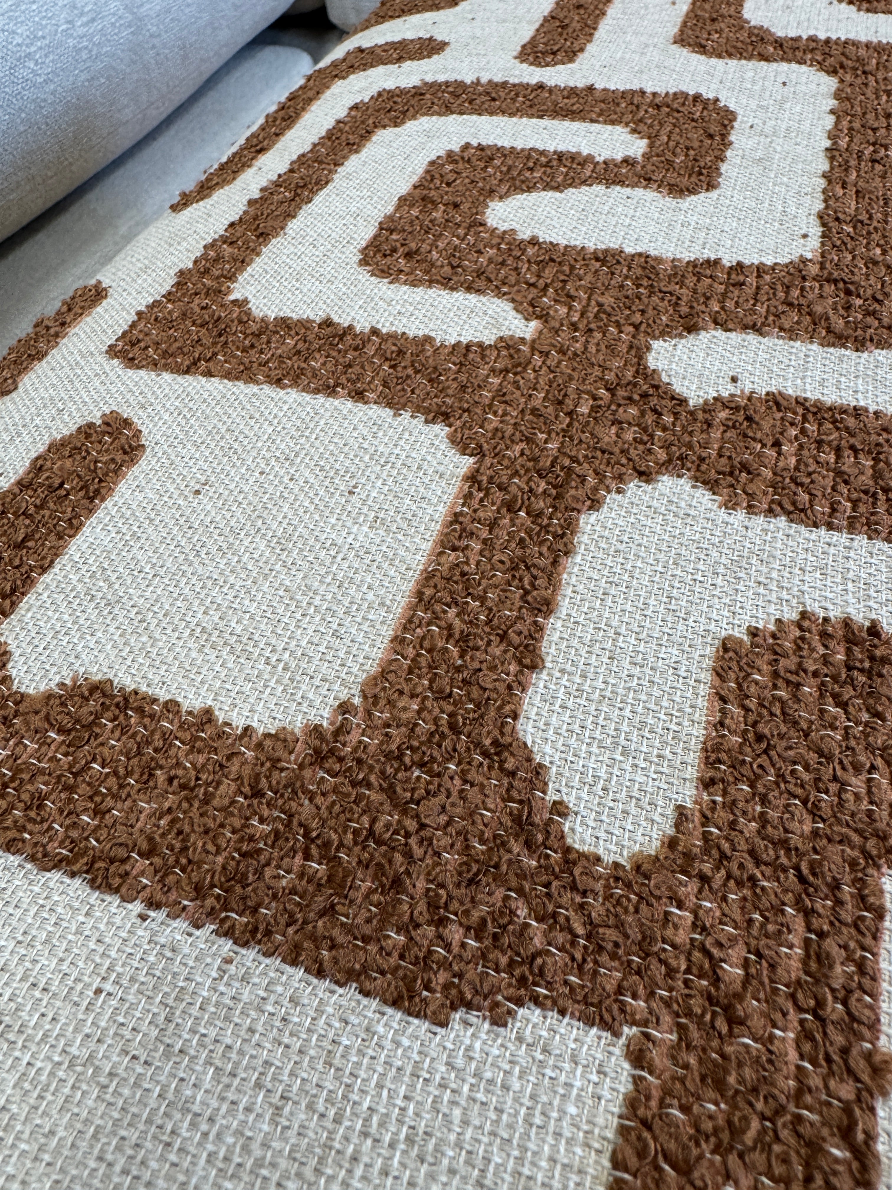 Tetbury padded top footstool in burnt orange & linen pattern fabric