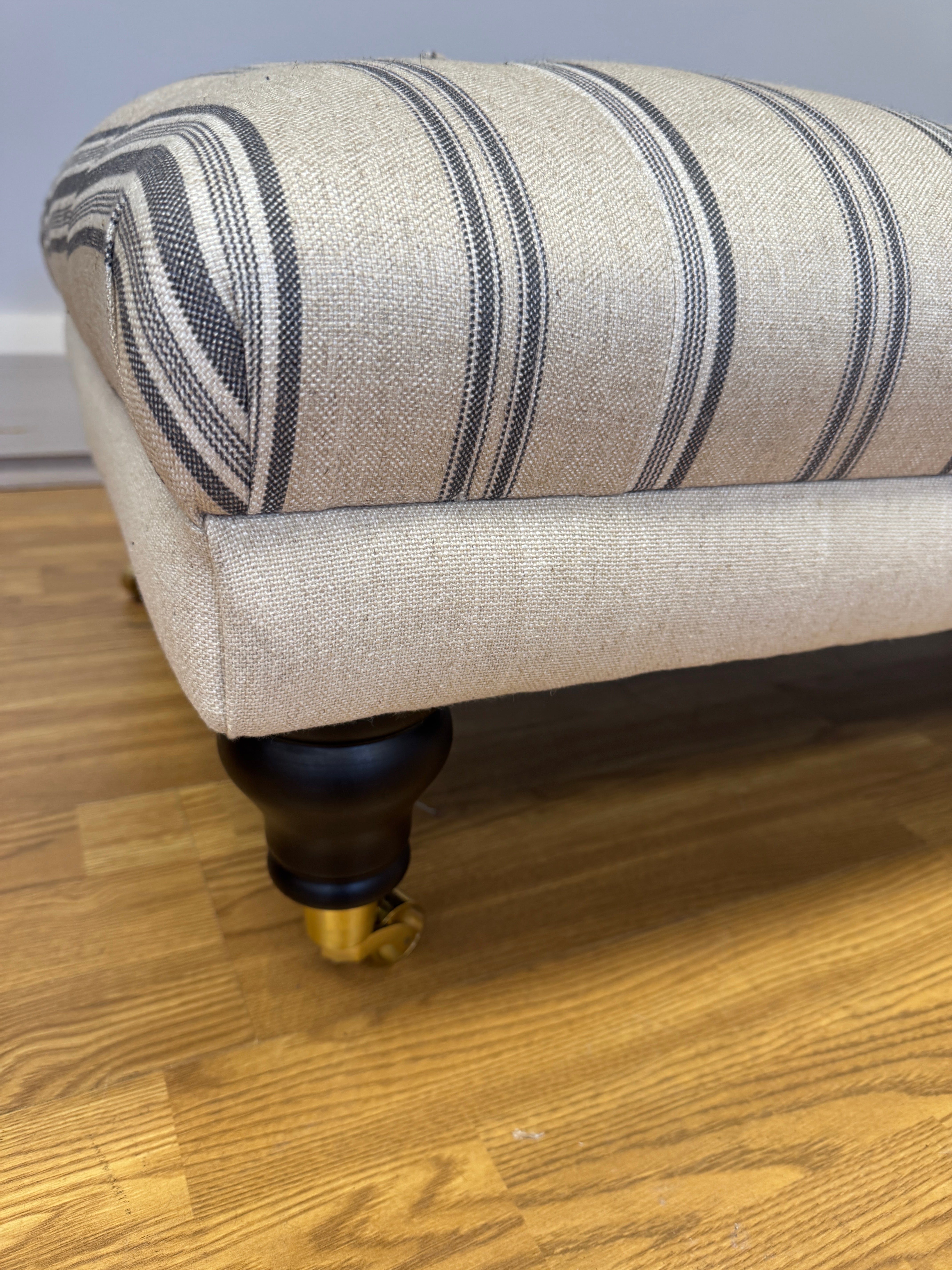 Boutique button top footstool in natural linen blue stripe fabric