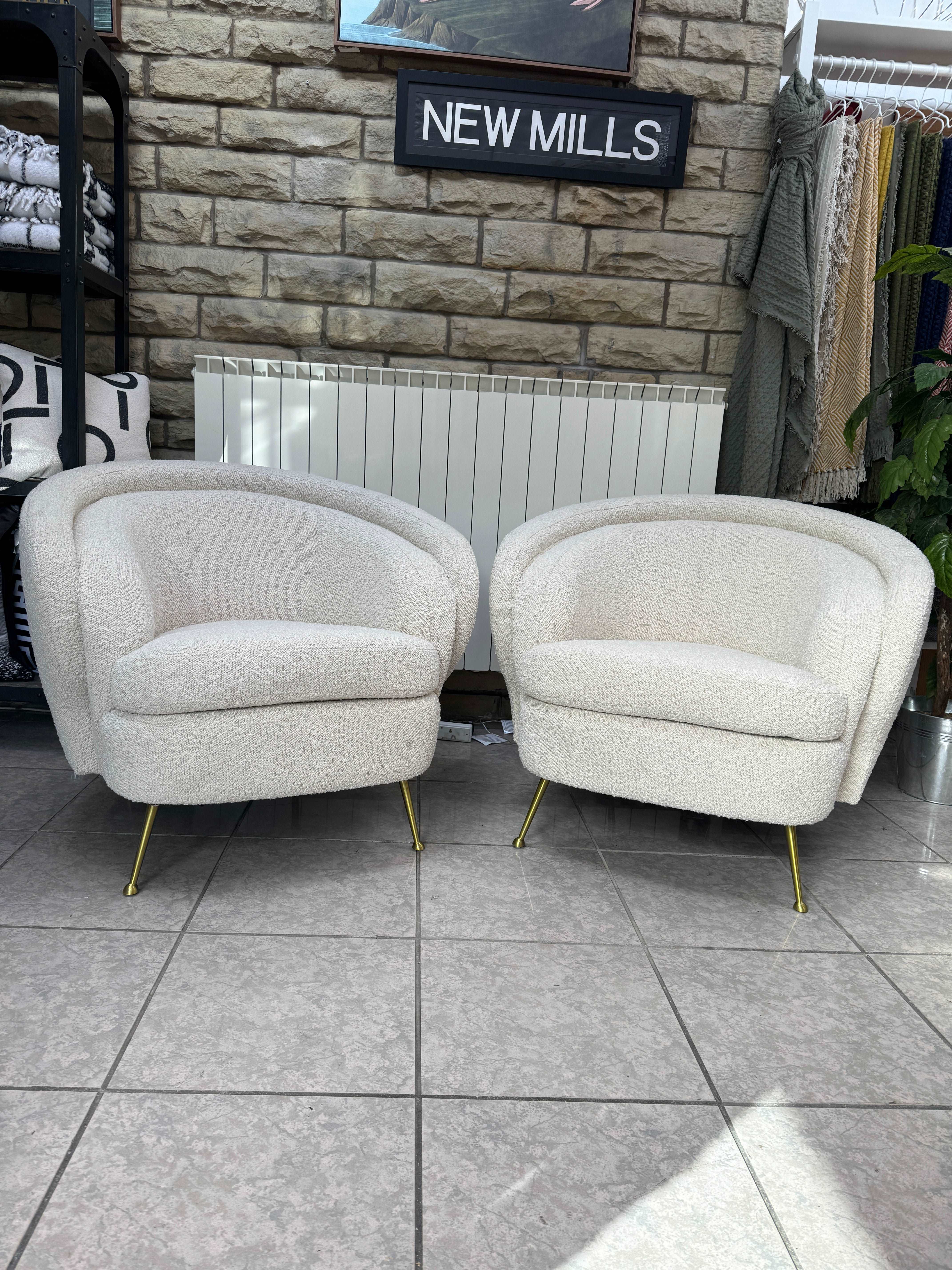 Eichholtz Orion curved back accent chair in cream boucle fabric