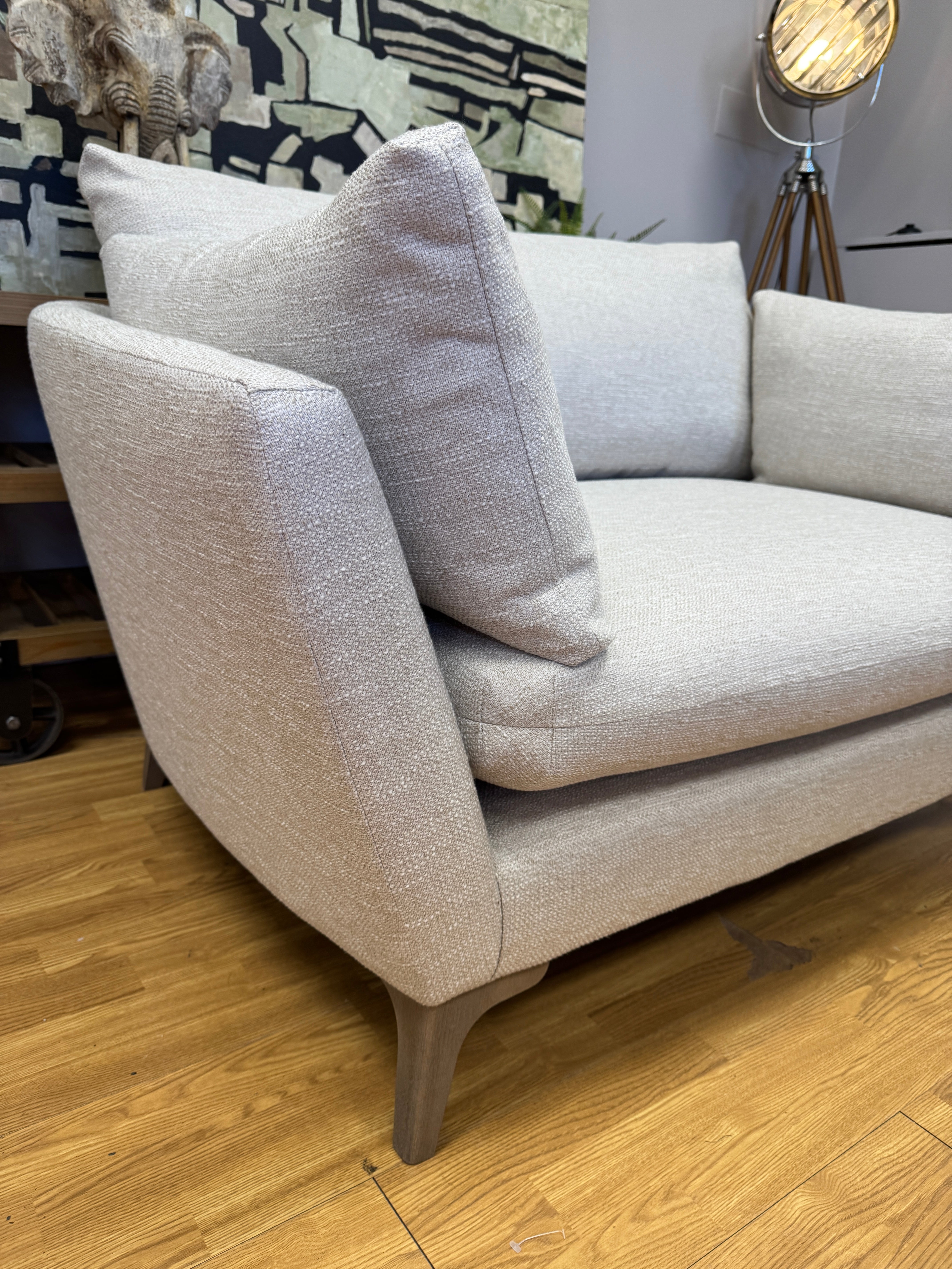 Elton curved sided loveseat in natural linen fabric