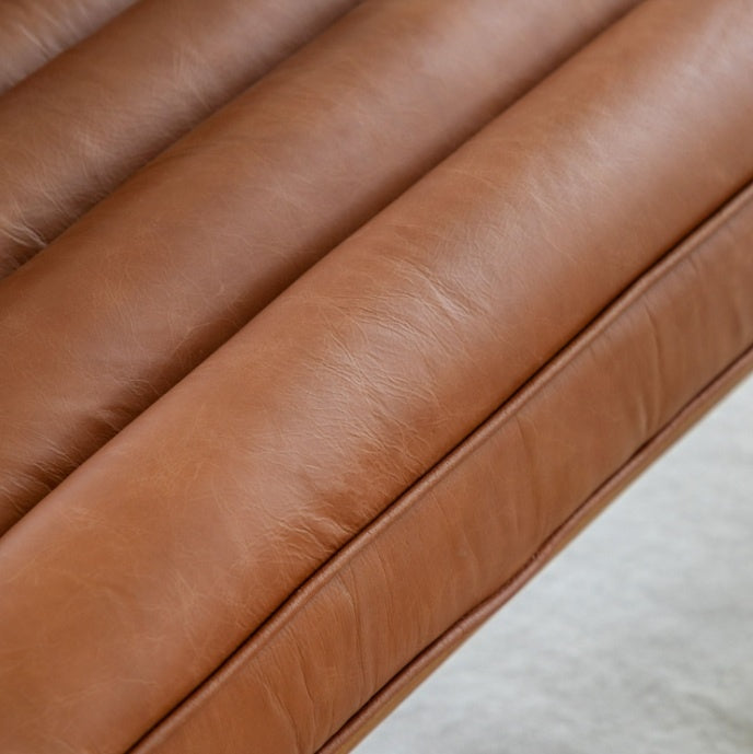 Datsun 2 seater ribbed leather sofa with oak frame
