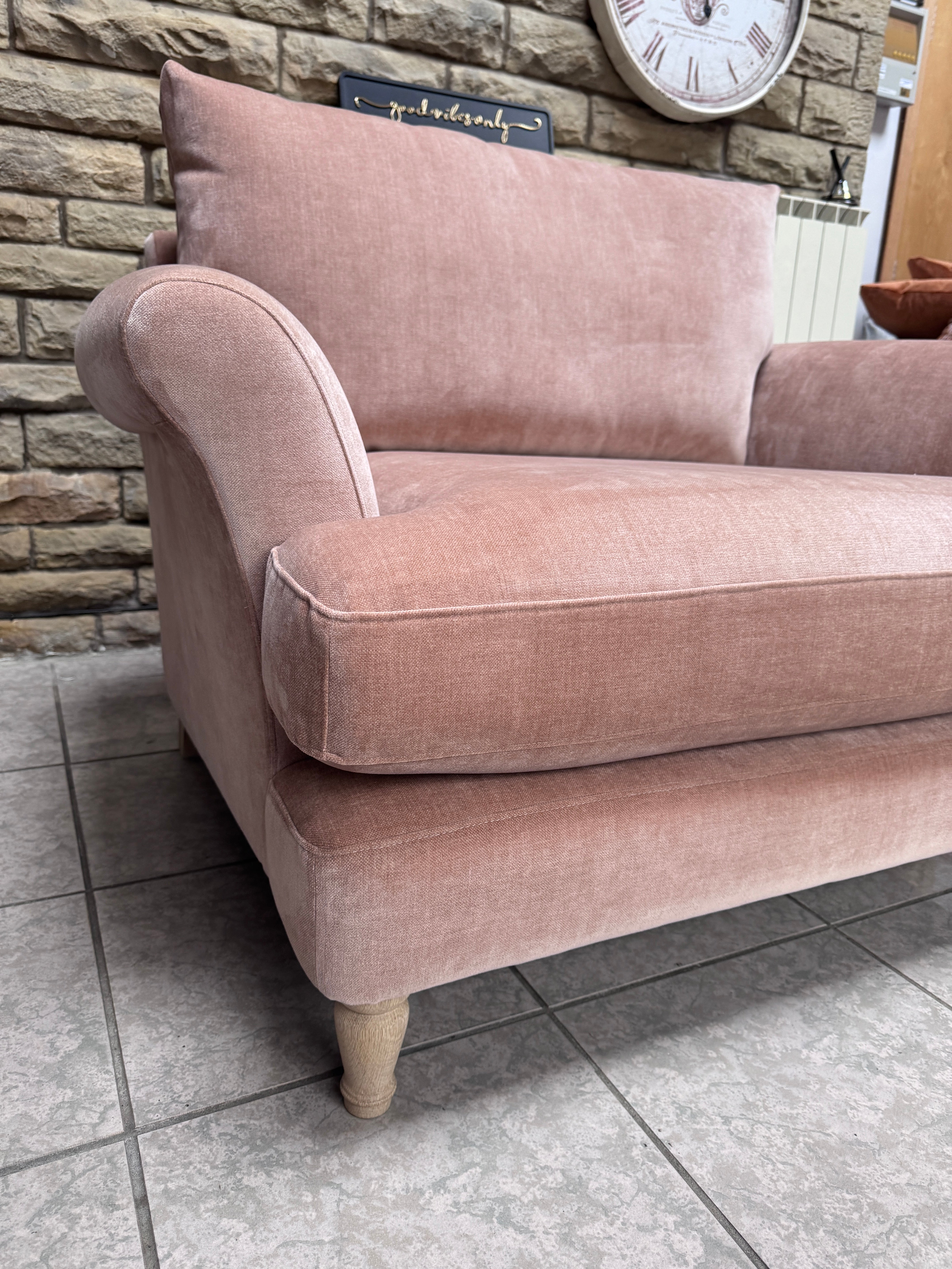 Iris loveseat with round arms in blush pink moleskin fabric