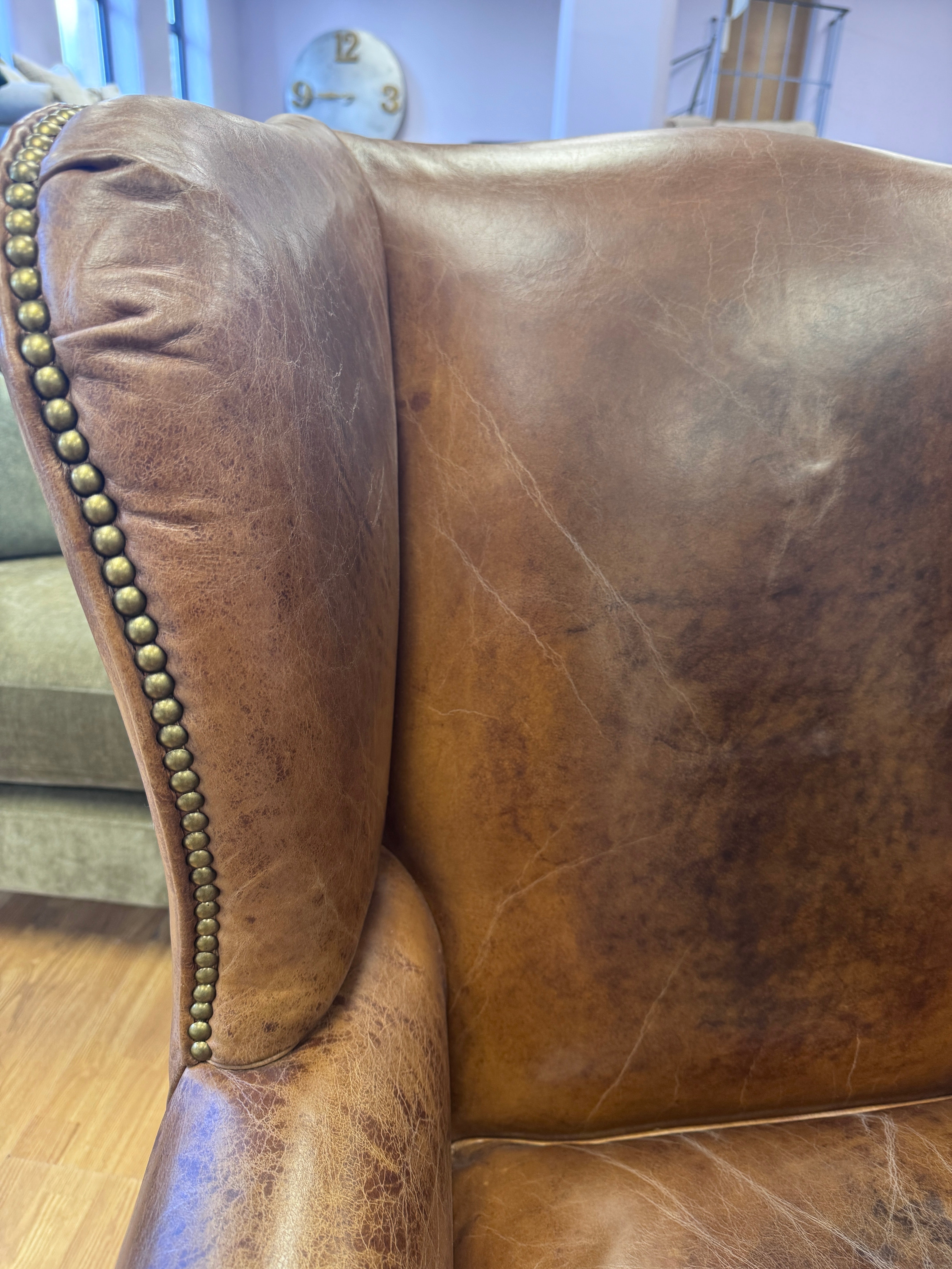 Halo wingback armchair in Cognac leather