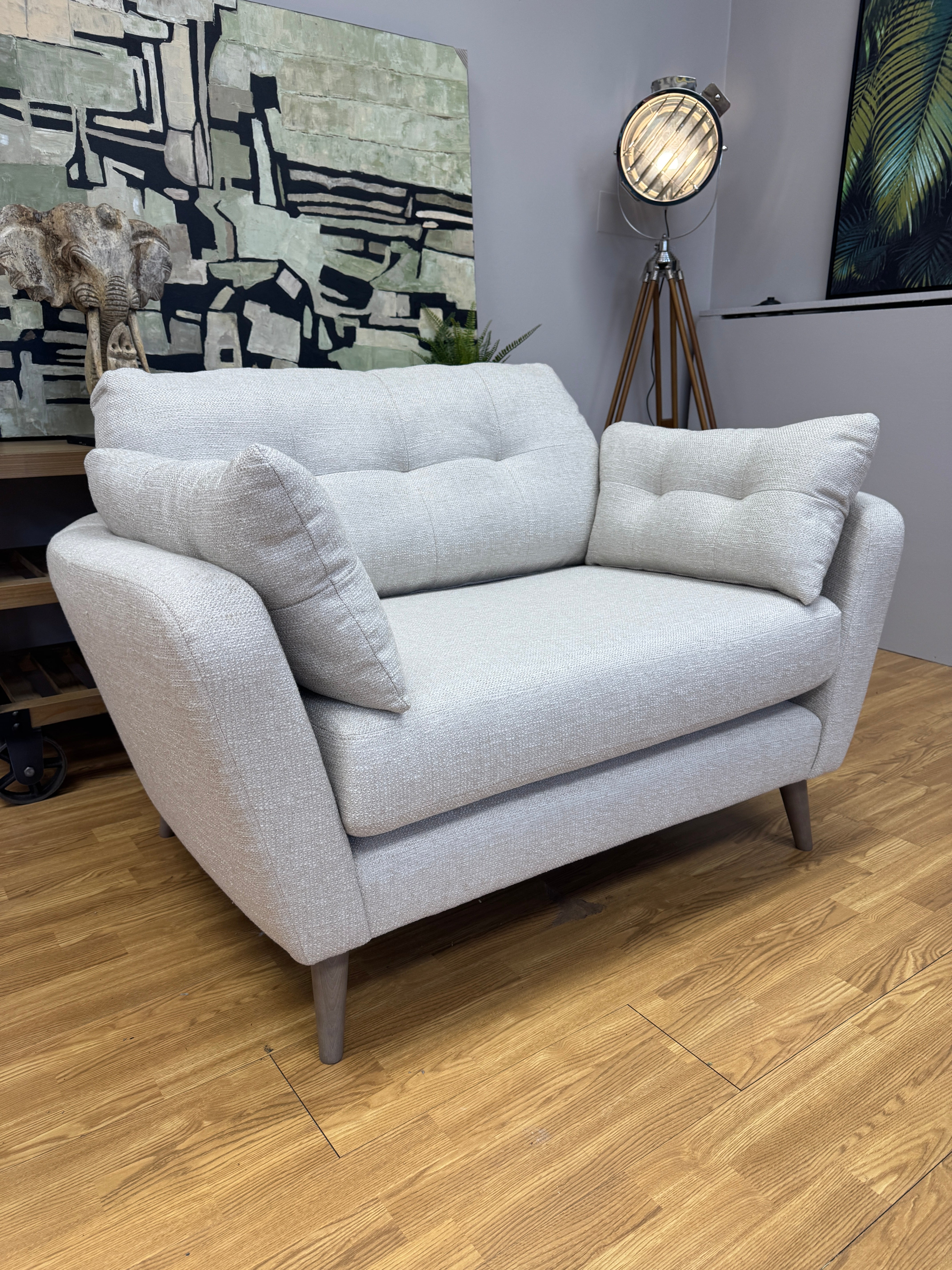 Lottie curved sided loveseat in natural soft weave fabric