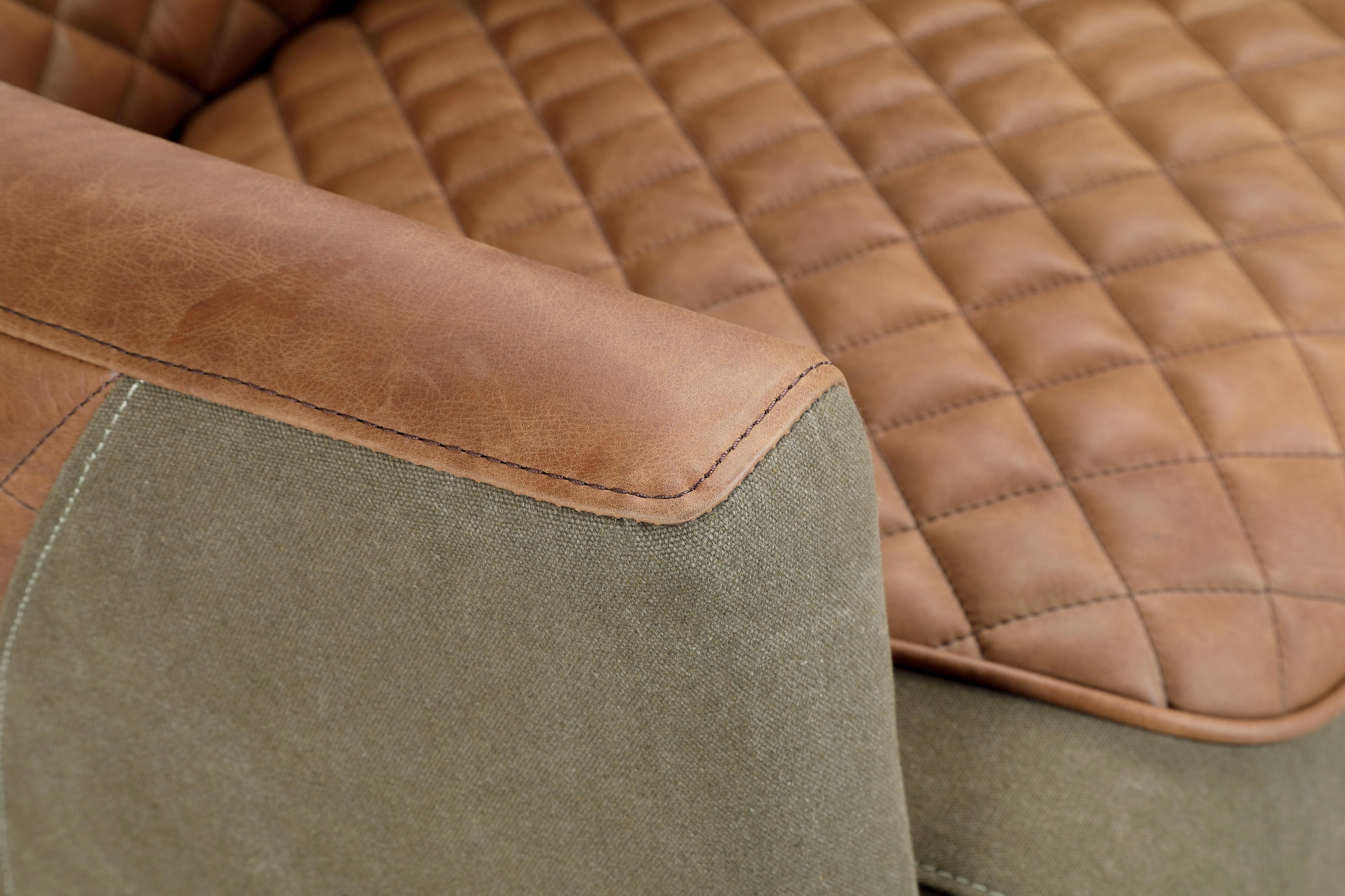 Vincent accent chair in quilted tan leather and khaki canvas