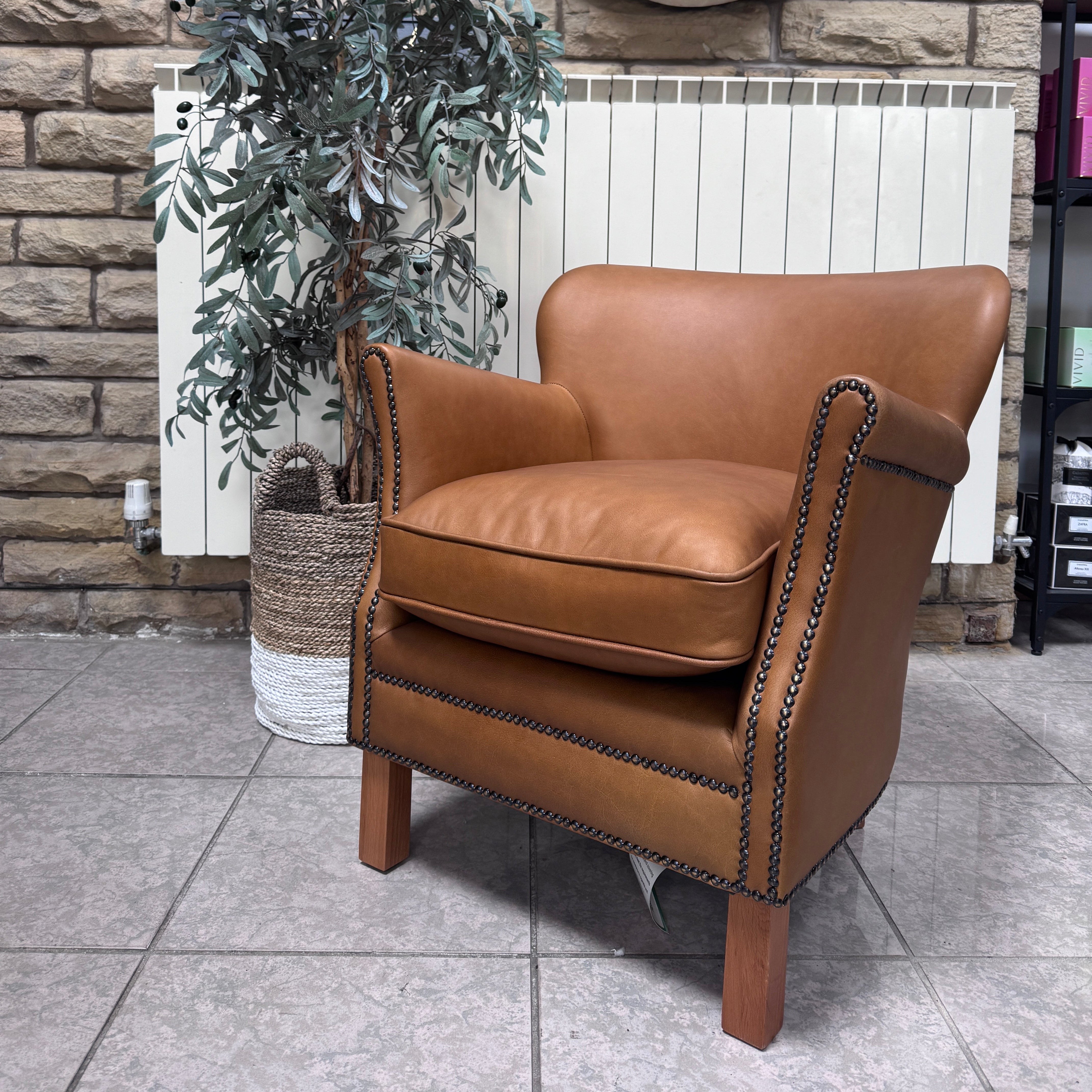 Adam accent chair in Tan brown leather with Natural linen reversible seat pad
