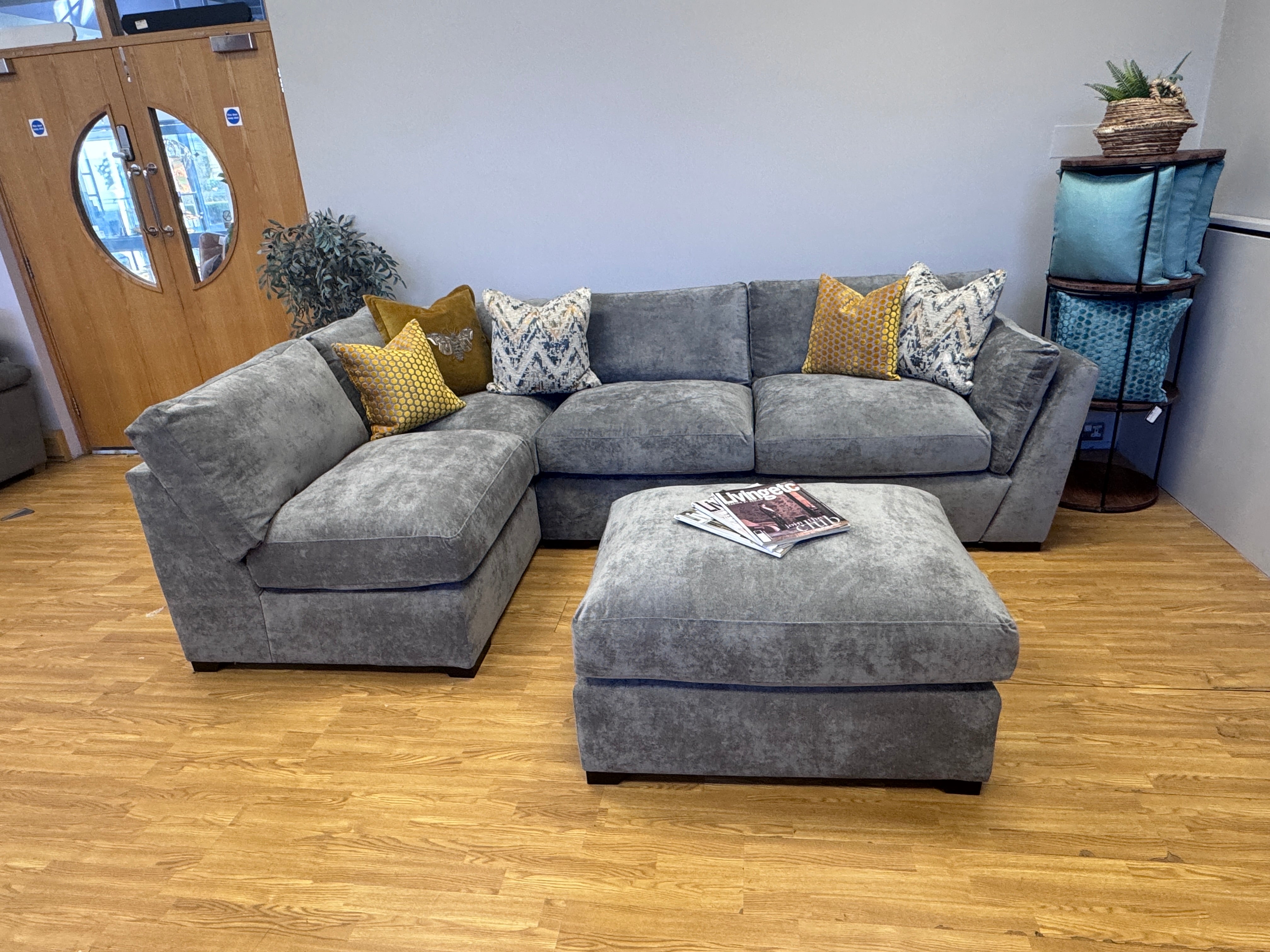 Phoenix left facing corner chaise sofa with footstool in Kingston Grey fabric