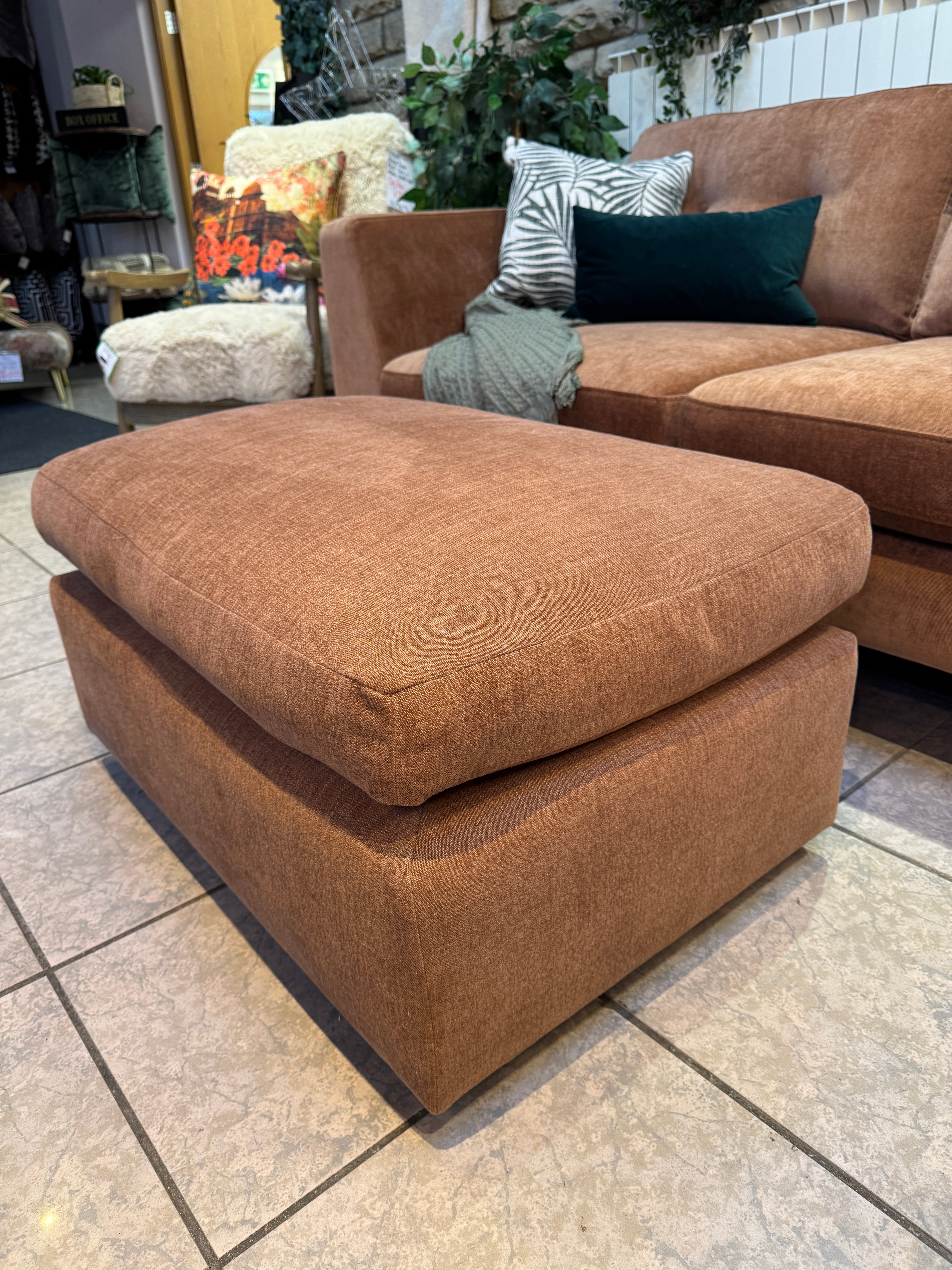 Designer rectangle padded top footstool in rust cotton fabric