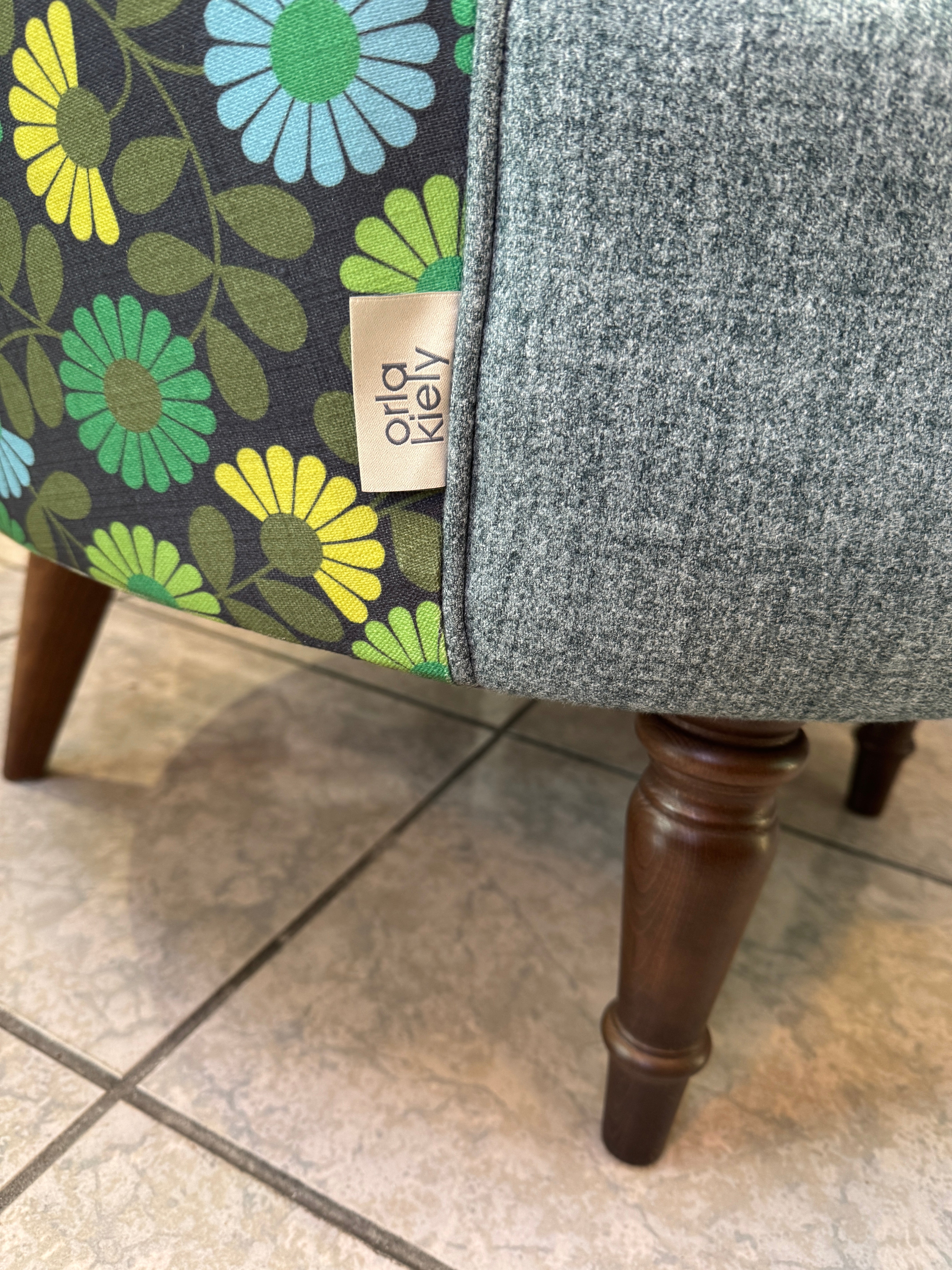 Orla Kiely Lily round tub chair in teal and multi daisy print fabric