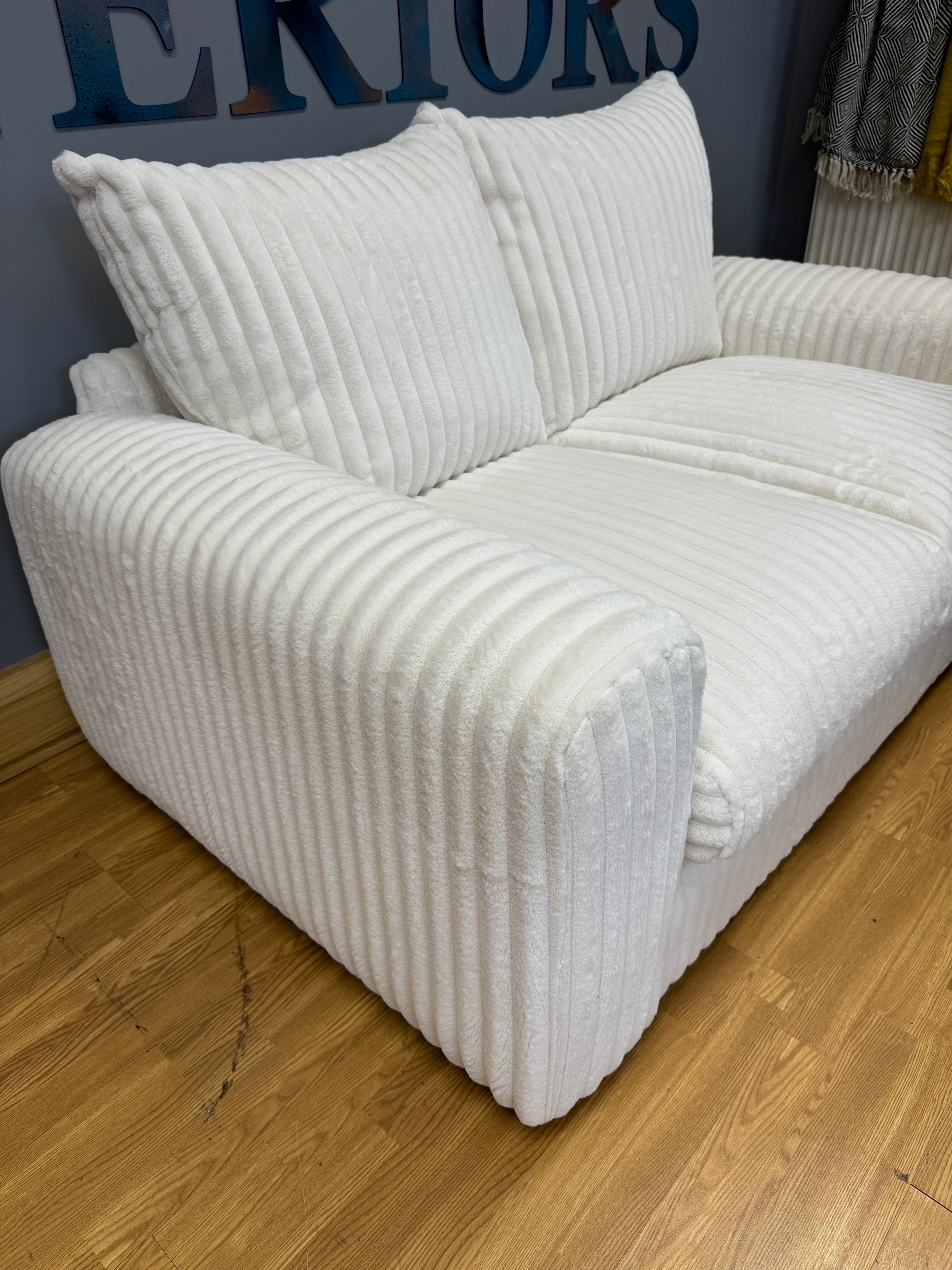 Reya 2 seater sofa in Casper snow off white faux ribbed fur