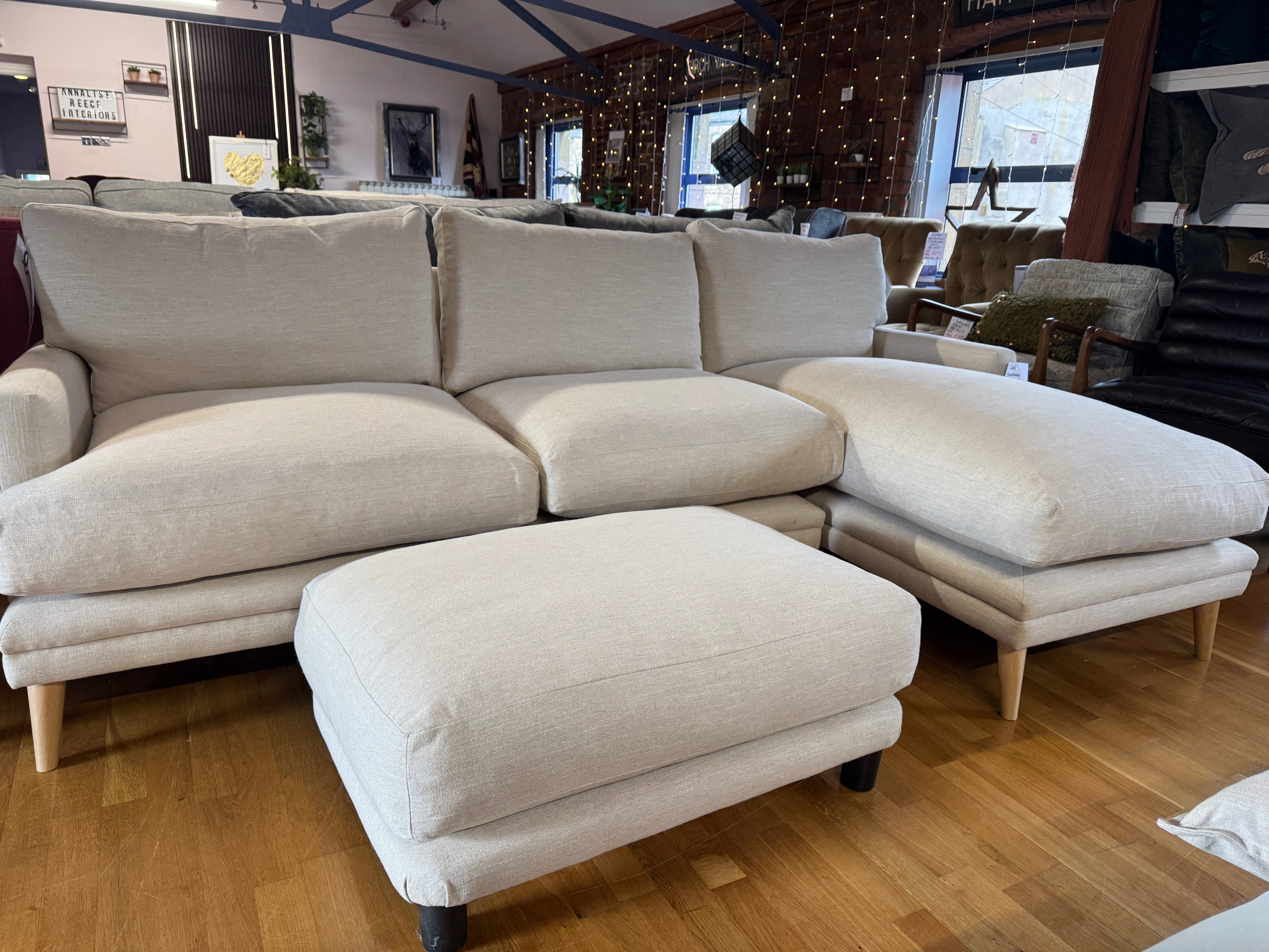 Loaf padded top footstool in clever vintage linen
