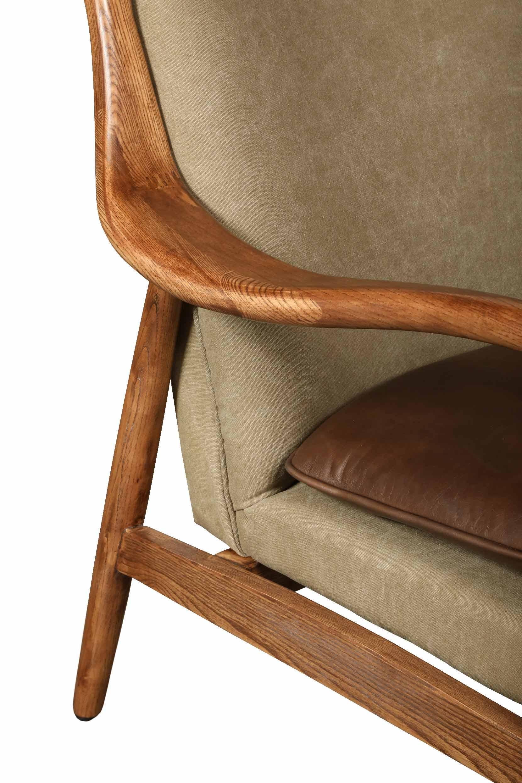 Salisbury accent chair in leather and canvas with polished wooden frame