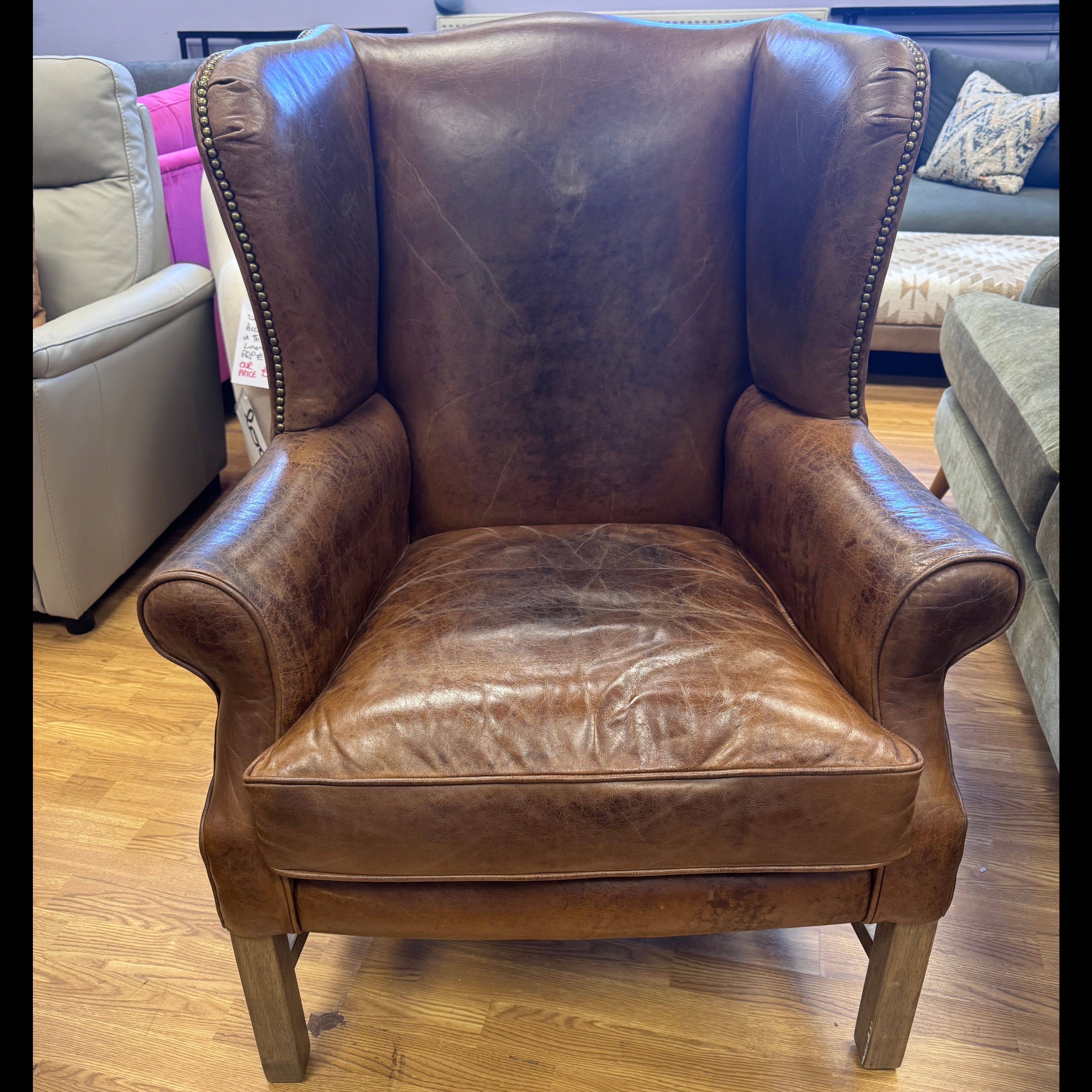 Halo wingback armchair in Cognac leather