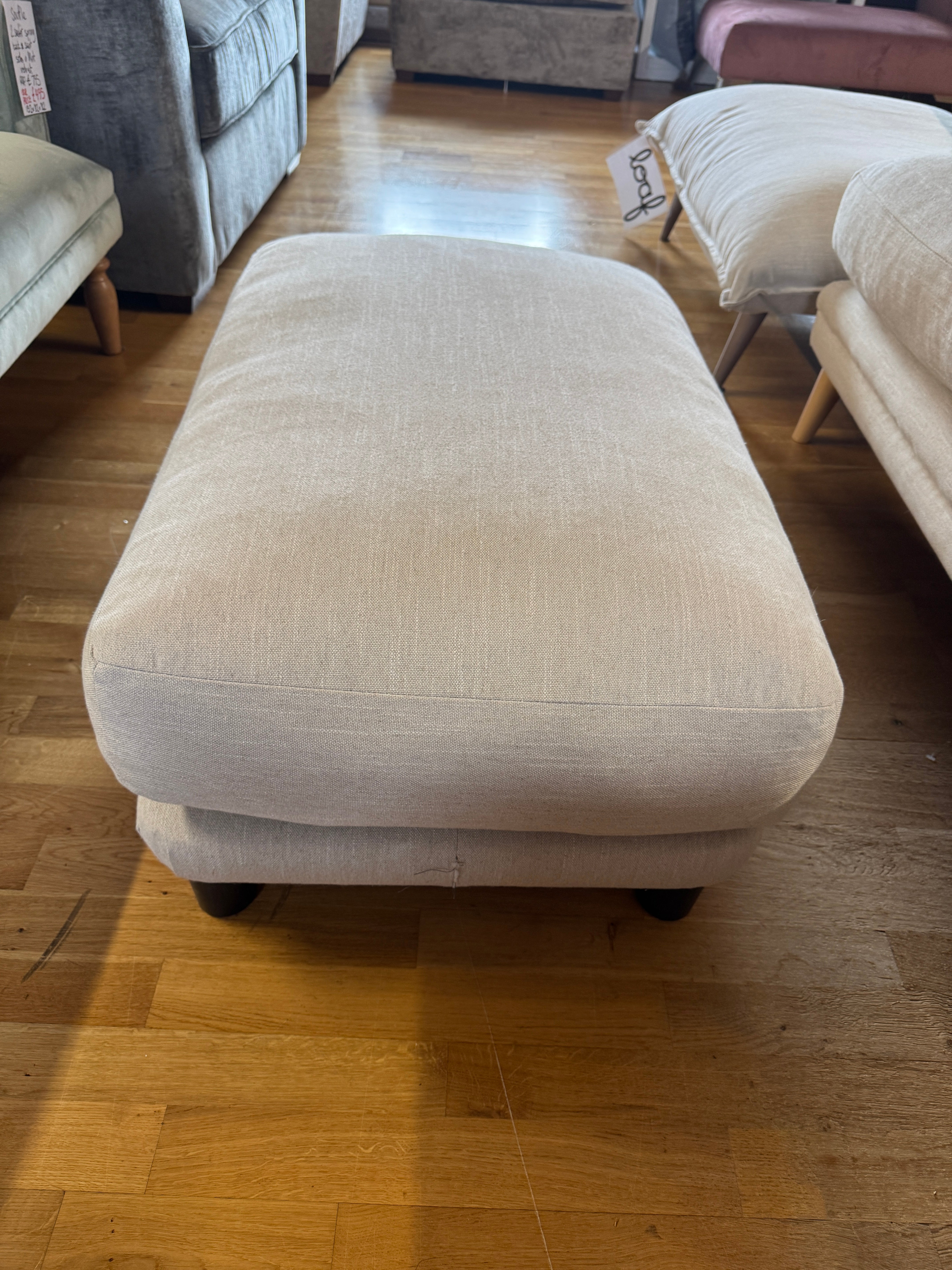 Padded top footstool in clever vintage linen