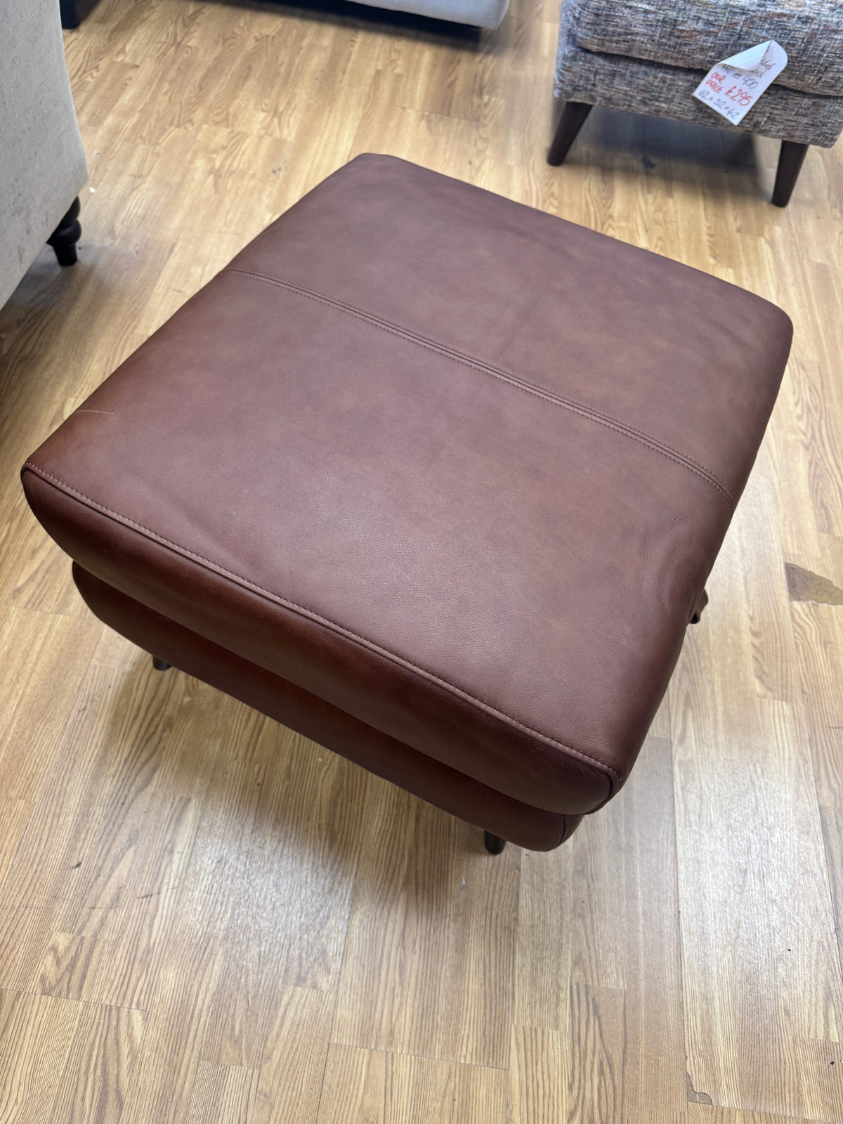 Adler storage footstool in soft tan brown leather