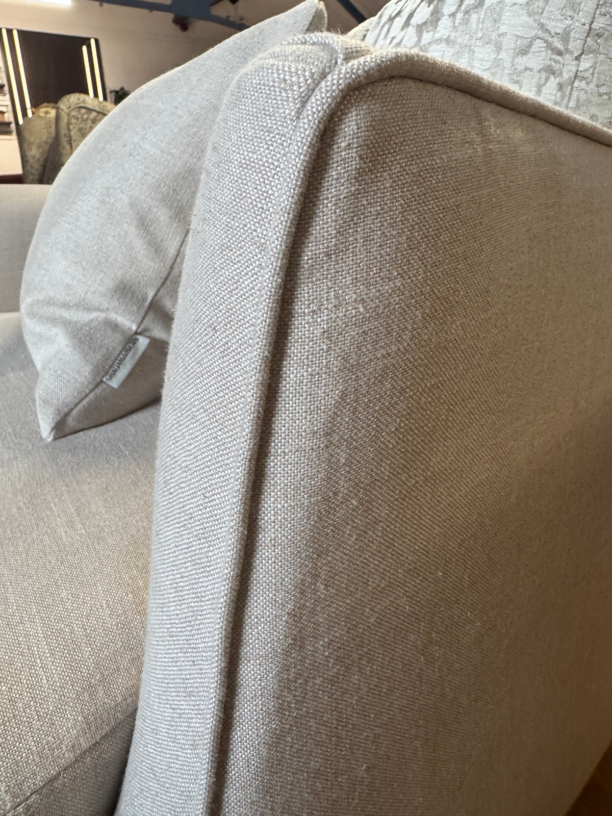 Haygarth loveseat / cuddle chair in natural linen fabric