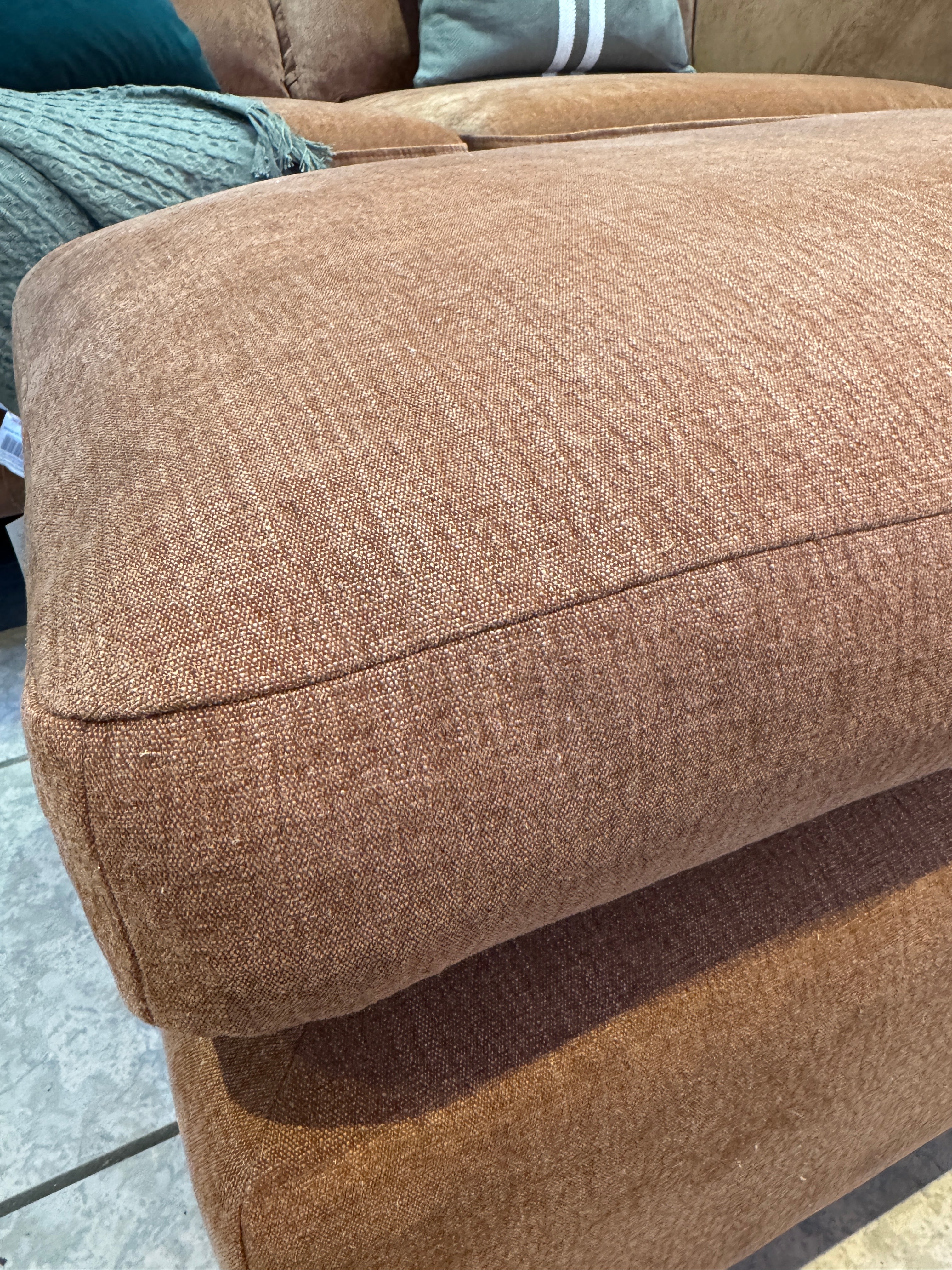 Designer rectangle padded top footstool in rust cotton fabric