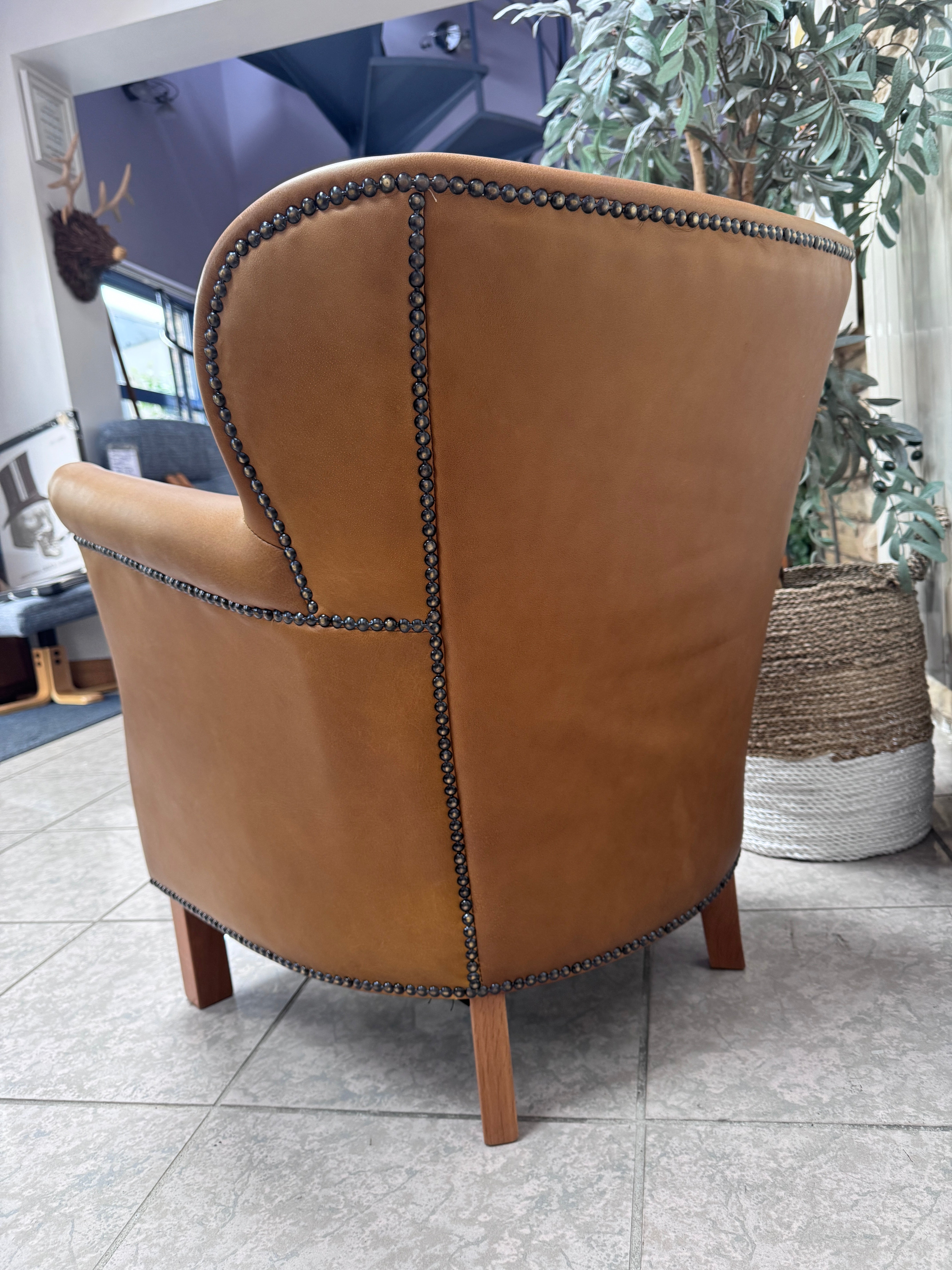 Adam accent chair in Tan brown leather with Natural linen reversible seat pad