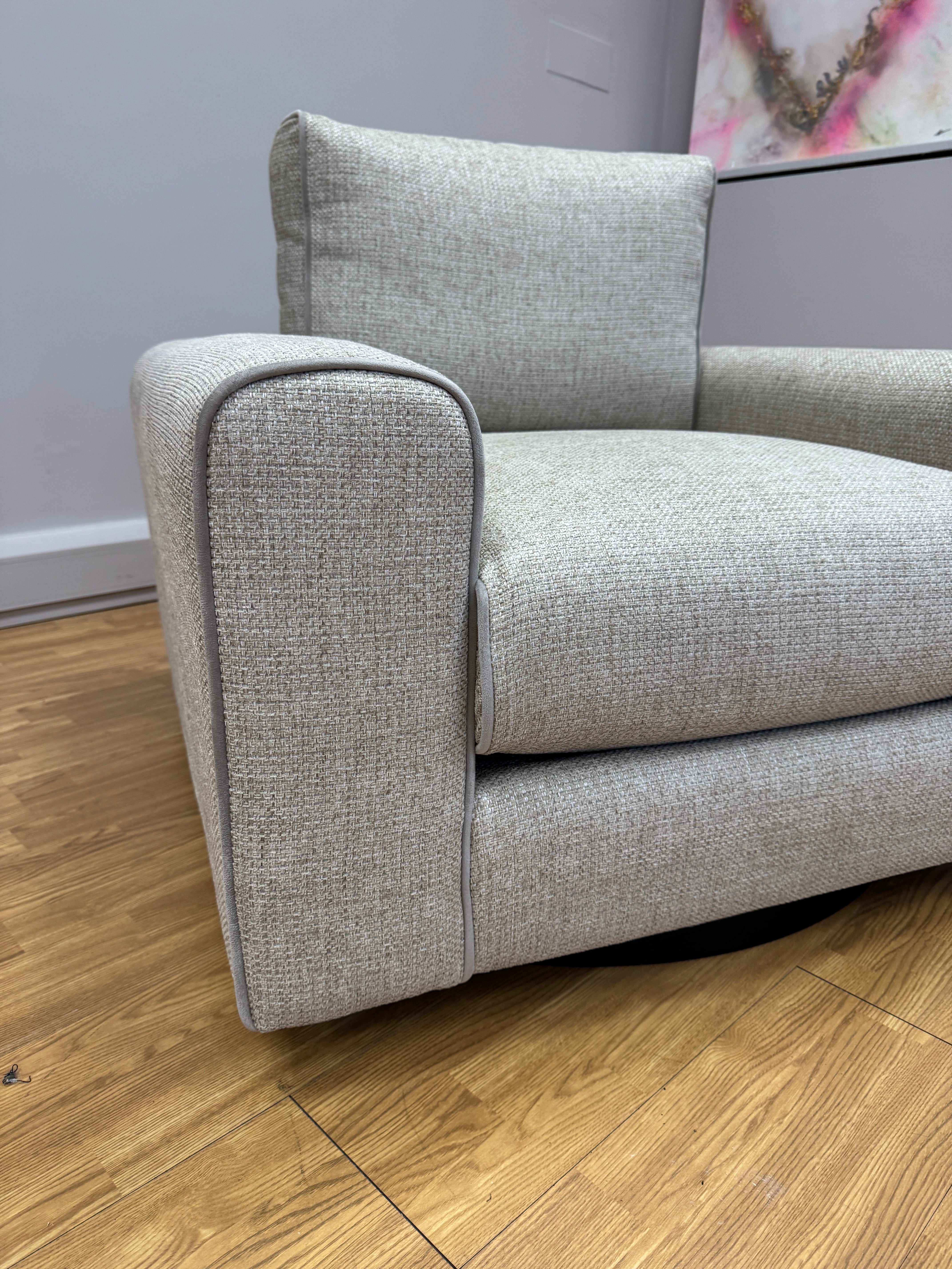 Sofology Stirling armchair on swivel base in chunky woven stone fabric