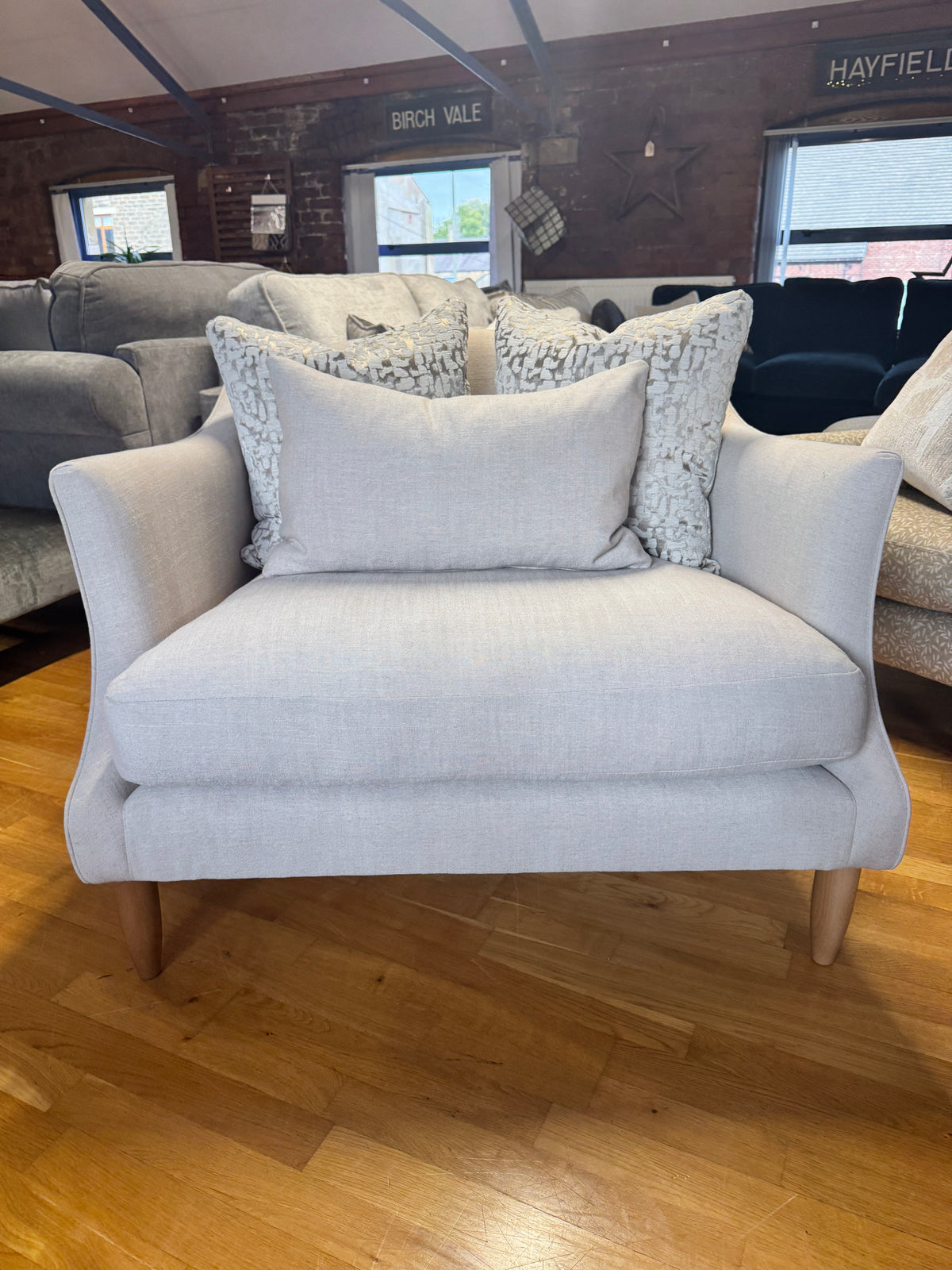 Haygarth loveseat / cuddle chair in natural linen fabric