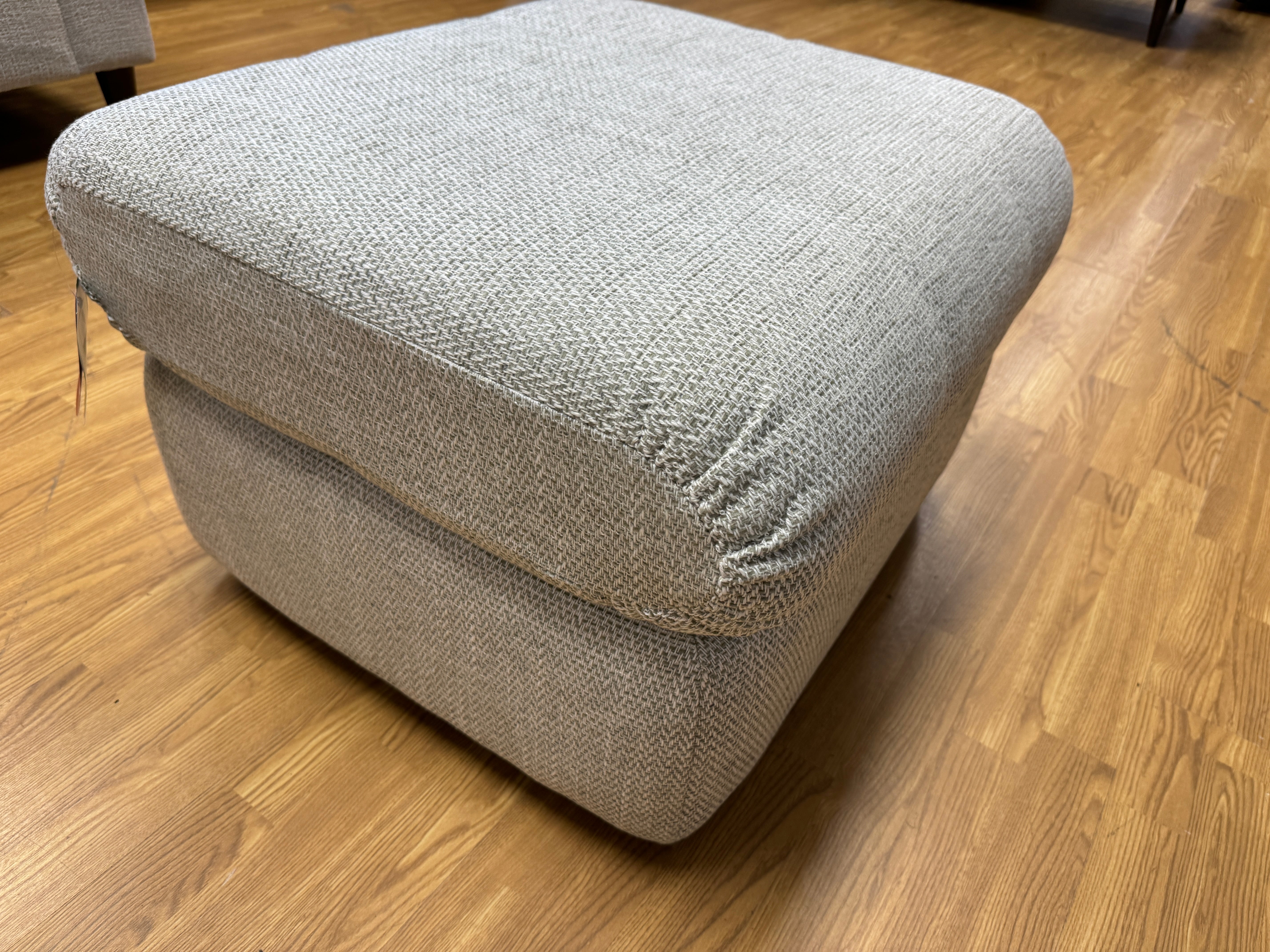 NEWMARKET padded top footstool in light grey weave fabric