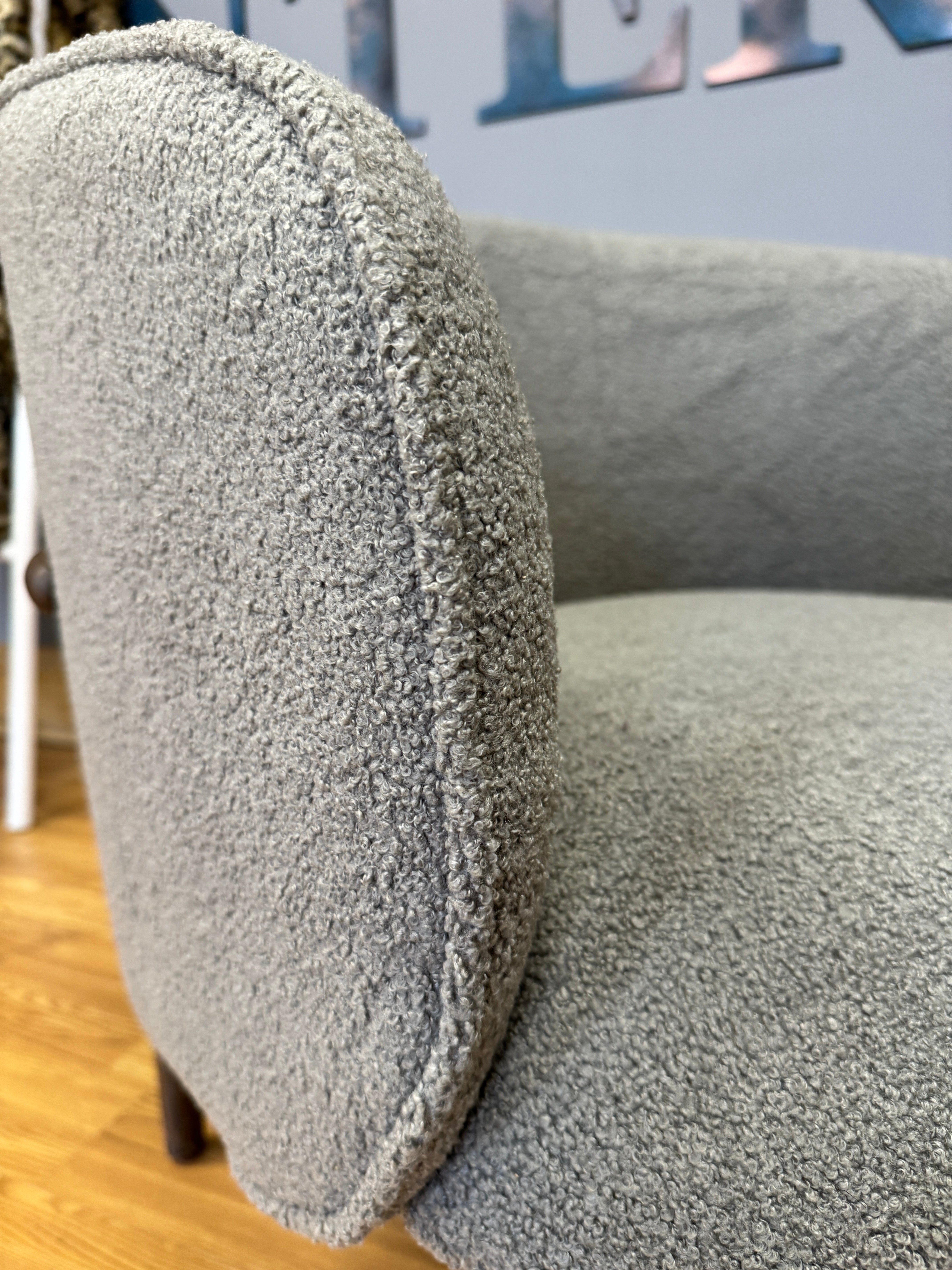 Flexure accent chair with grey boucle ash wooden frame