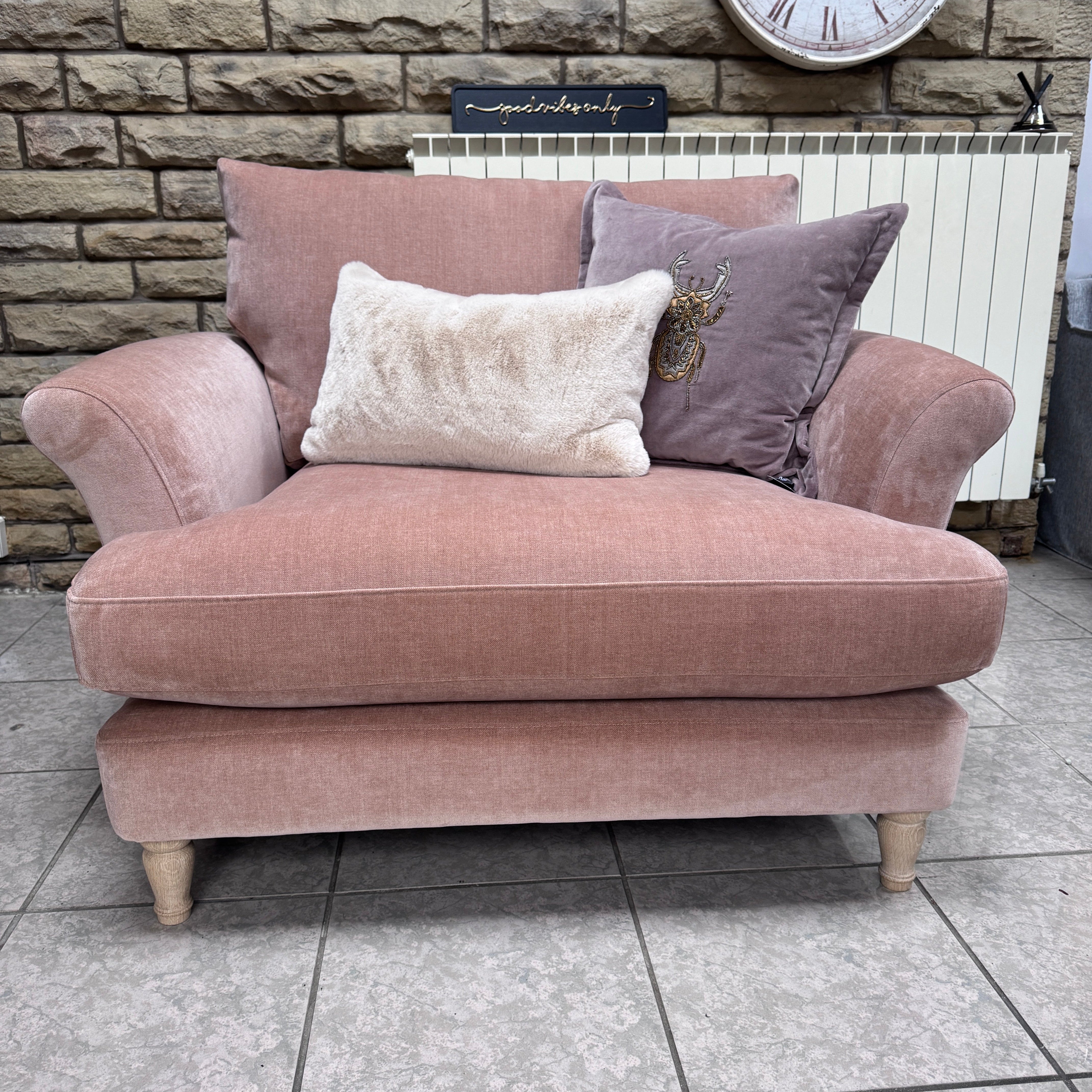 Iris loveseat with round arms in blush pink moleskin fabric