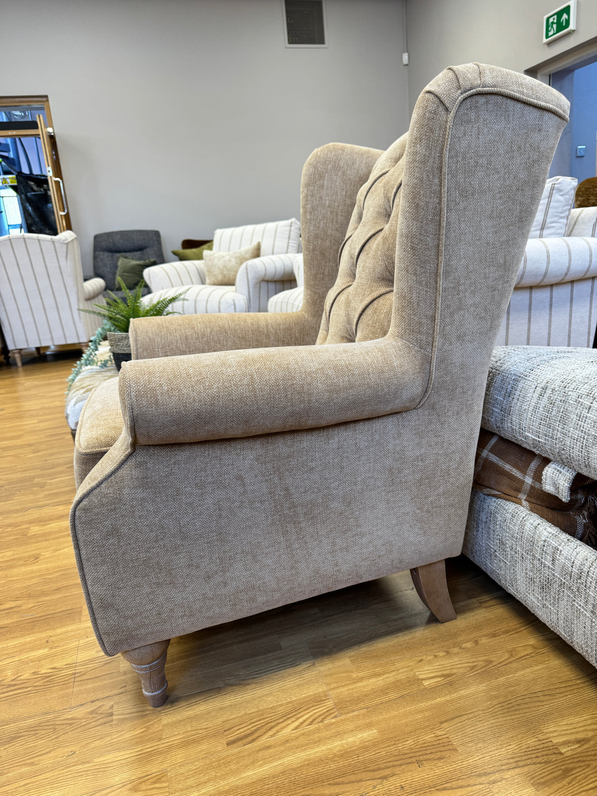 Heather high button back winged armchair in Marni Toffee chenille