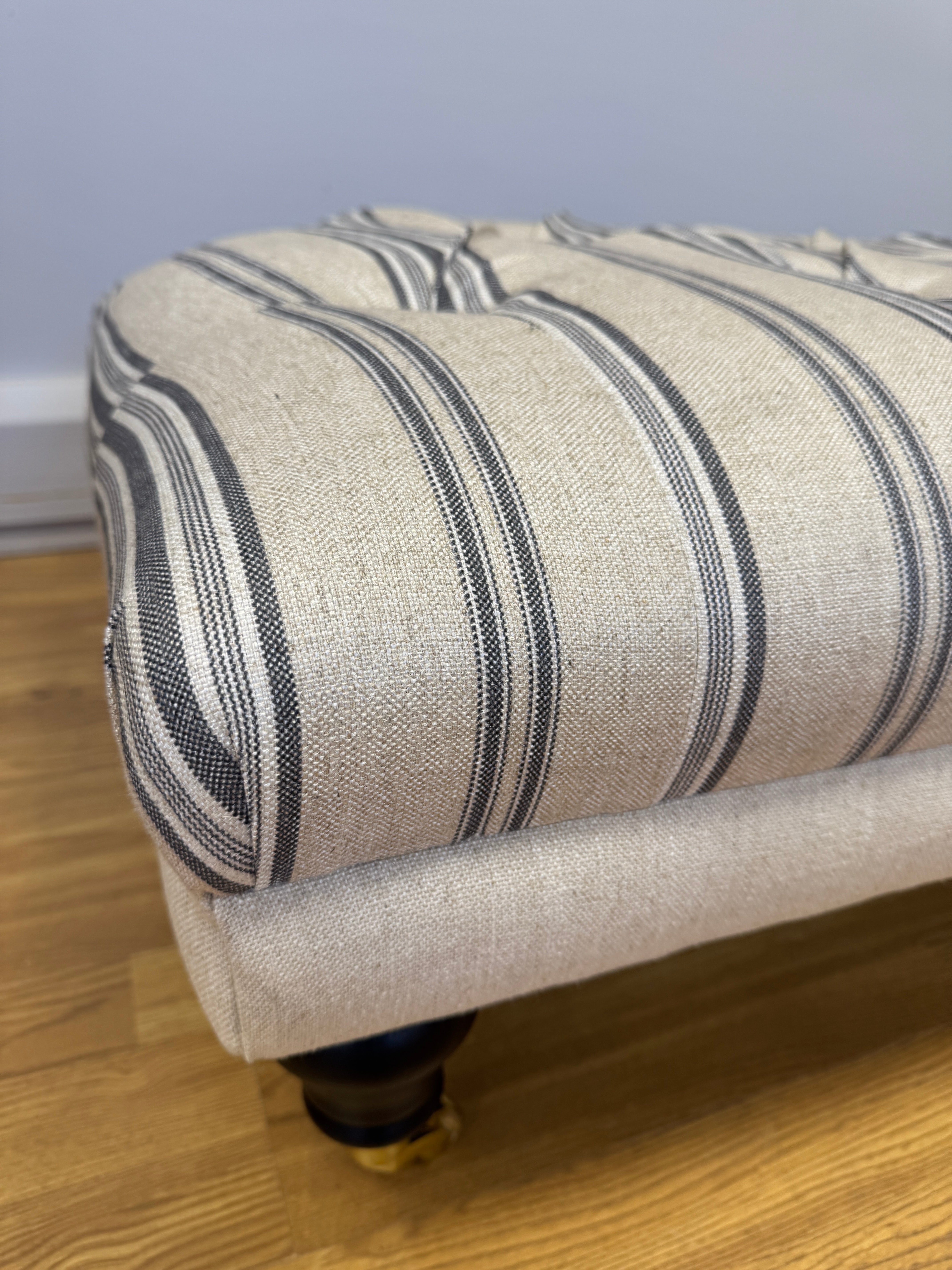 Boutique button top footstool in natural linen blue stripe fabric