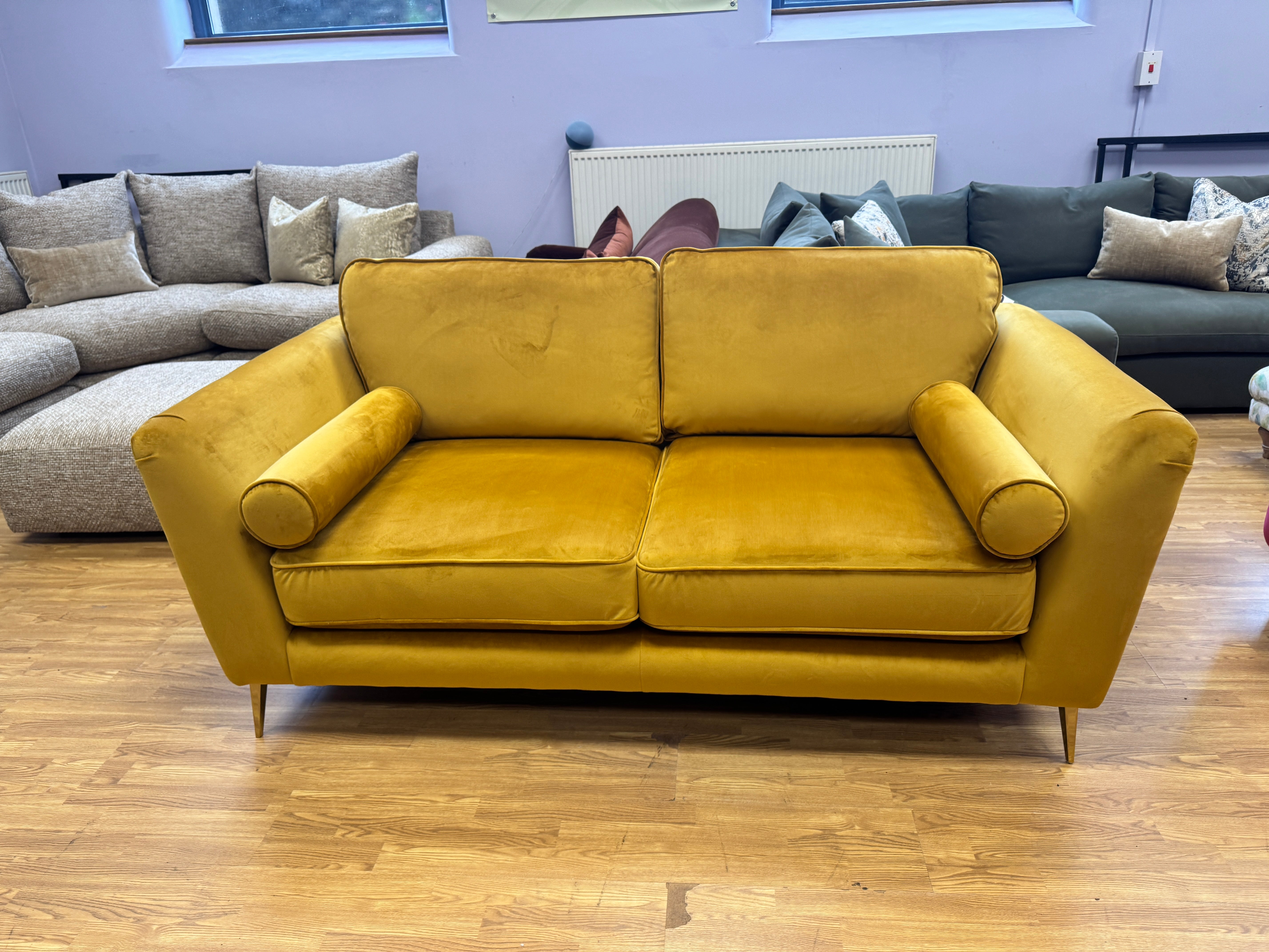 Show Stoppa 3 seater sofa with bolster cushions in amber gold velvet
