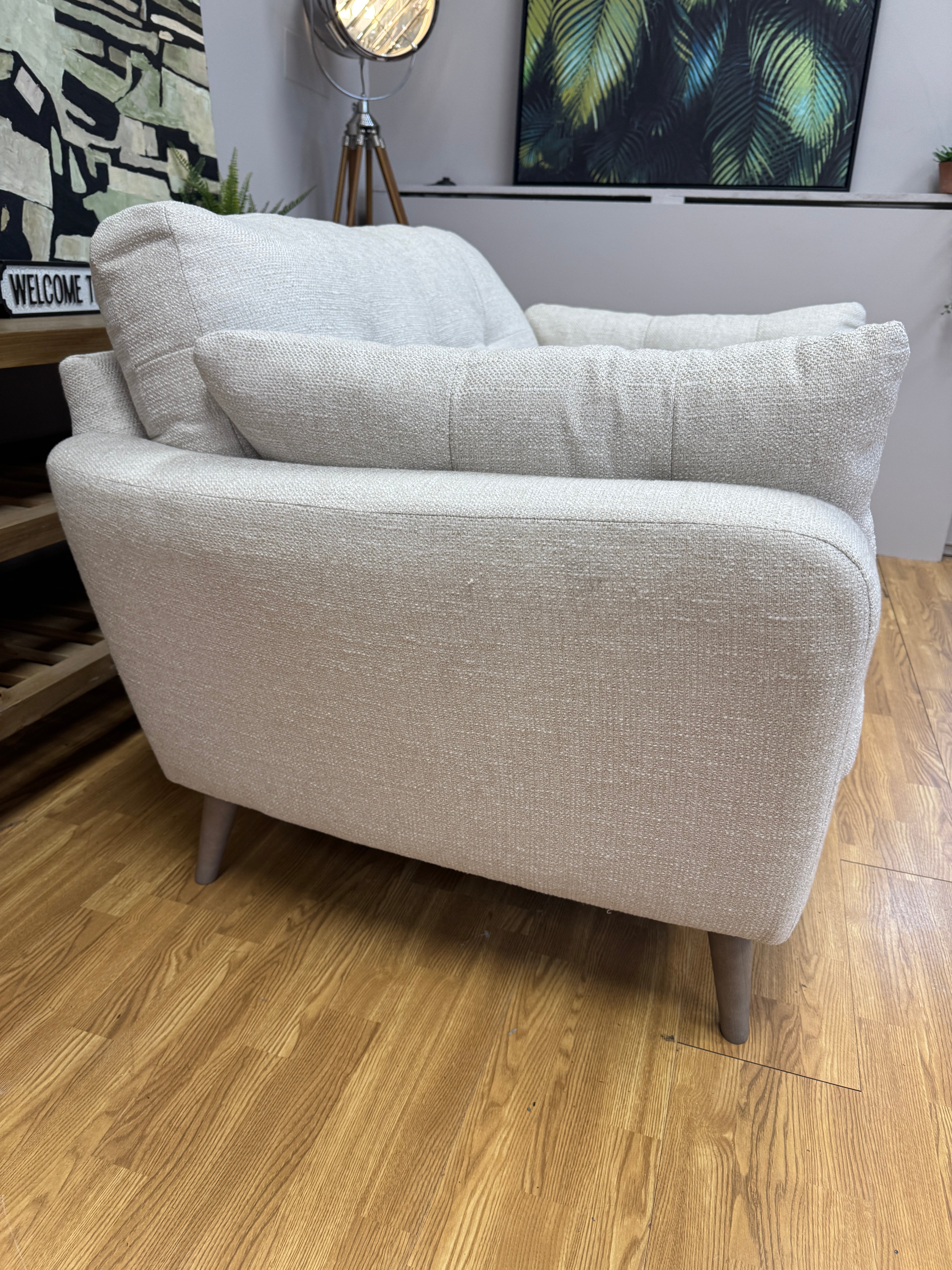 Lottie curved sided loveseat in natural soft weave fabric