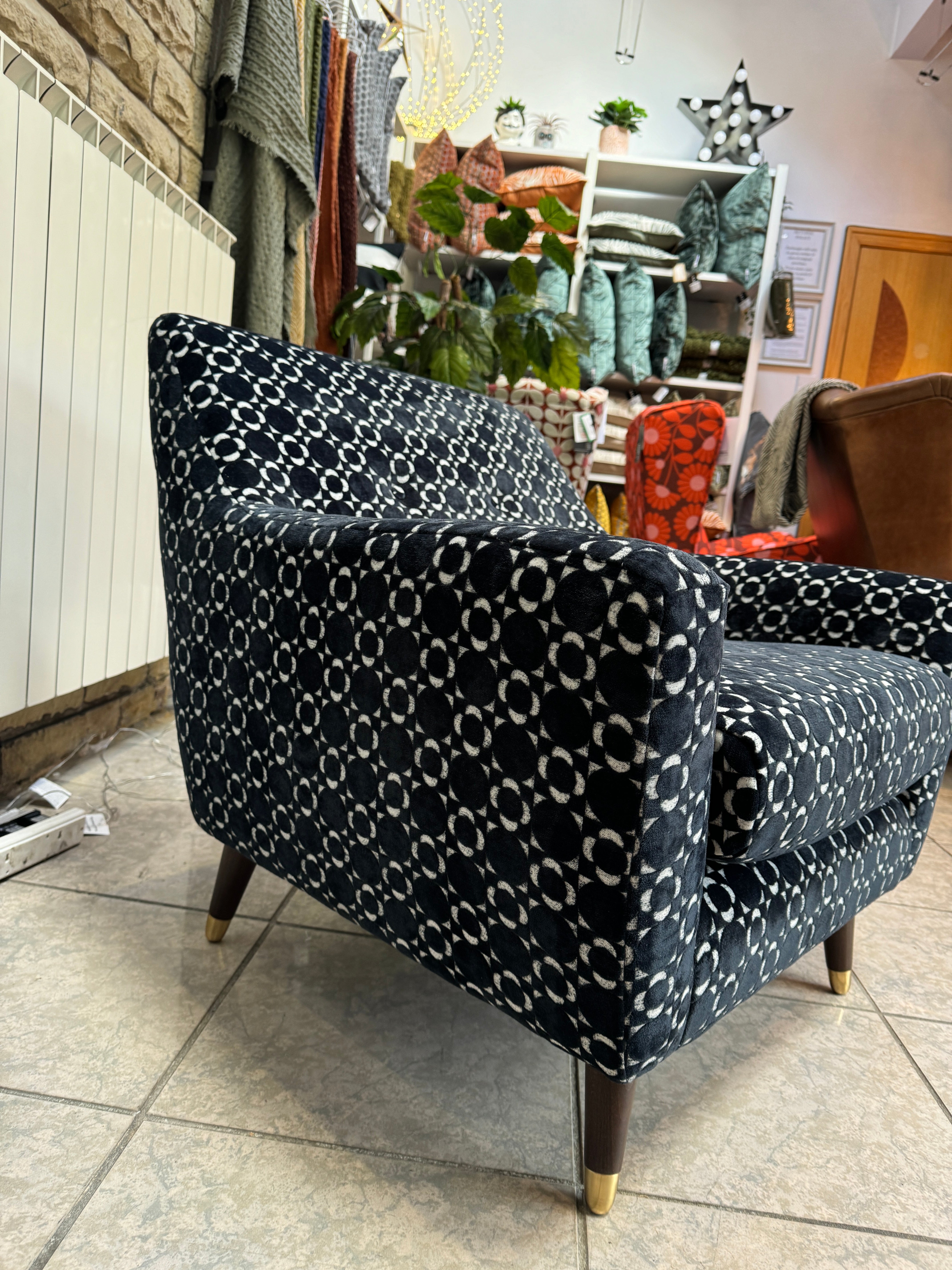 Orla Kiely Rose accent chair in retro tile black velvet fabric