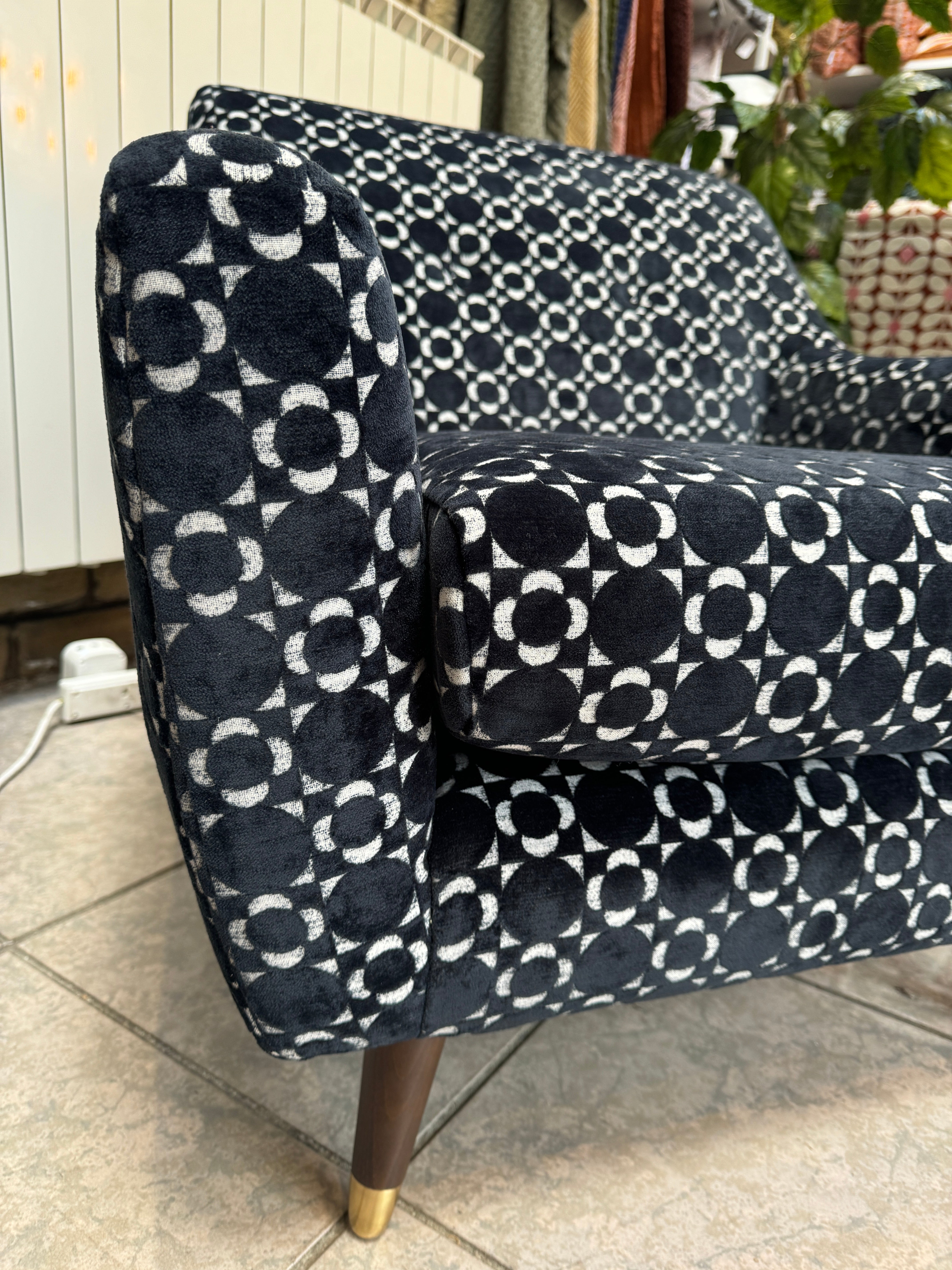 Orla Kiely Rose accent chair in retro tile black velvet fabric