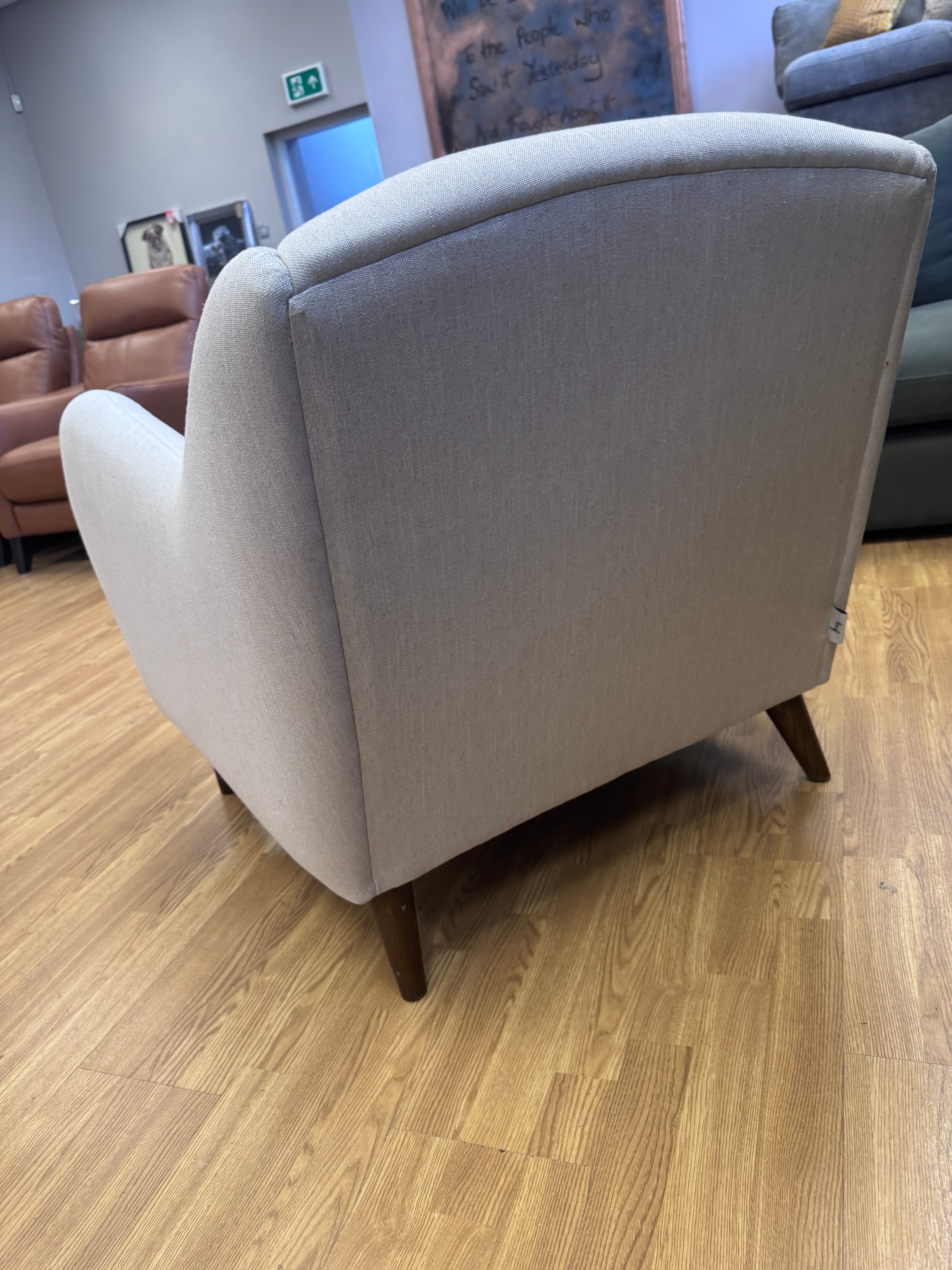 Sample fireside accent chair in Thatch house fabric