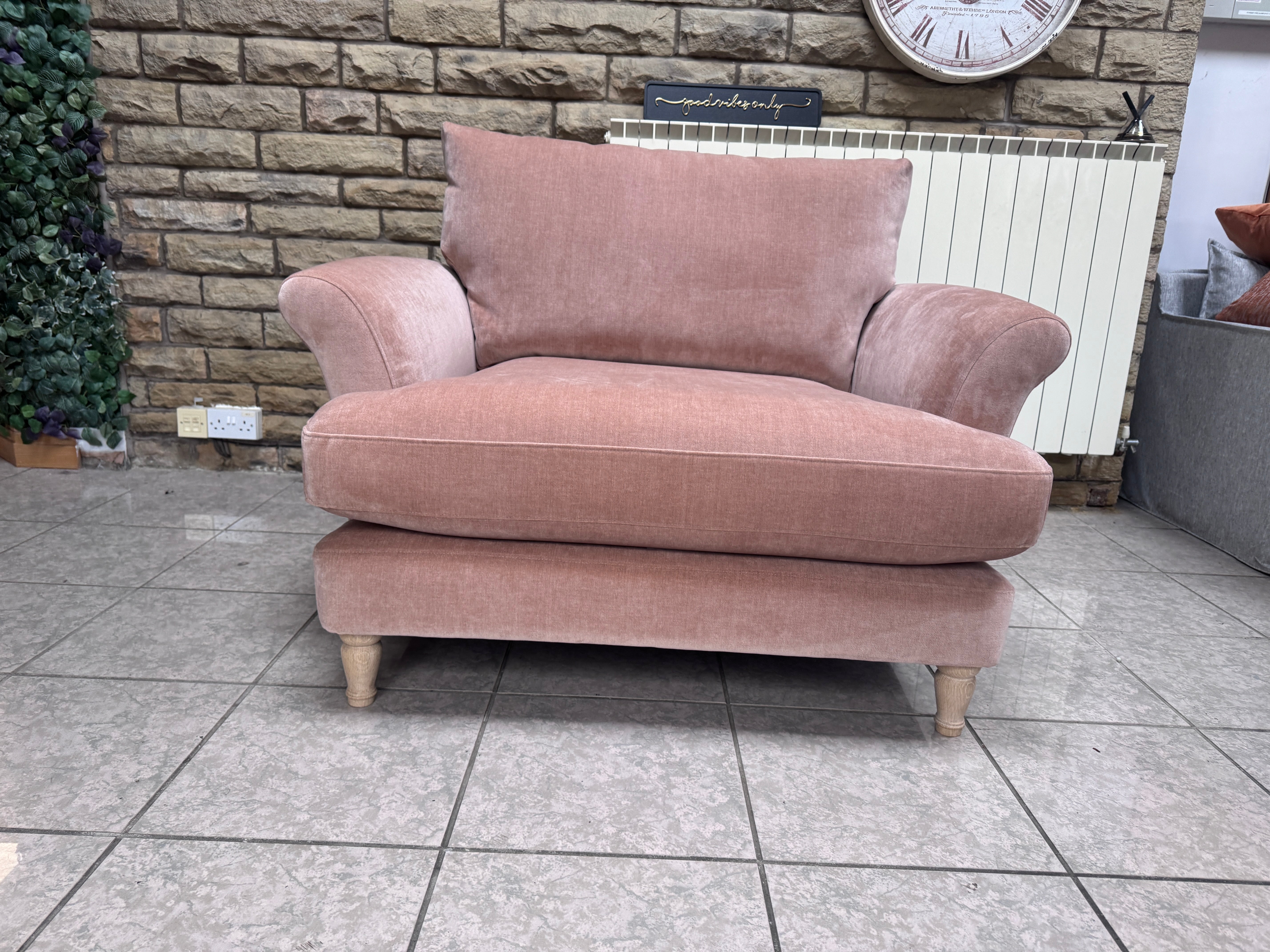 Iris loveseat with round arms in blush pink moleskin fabric