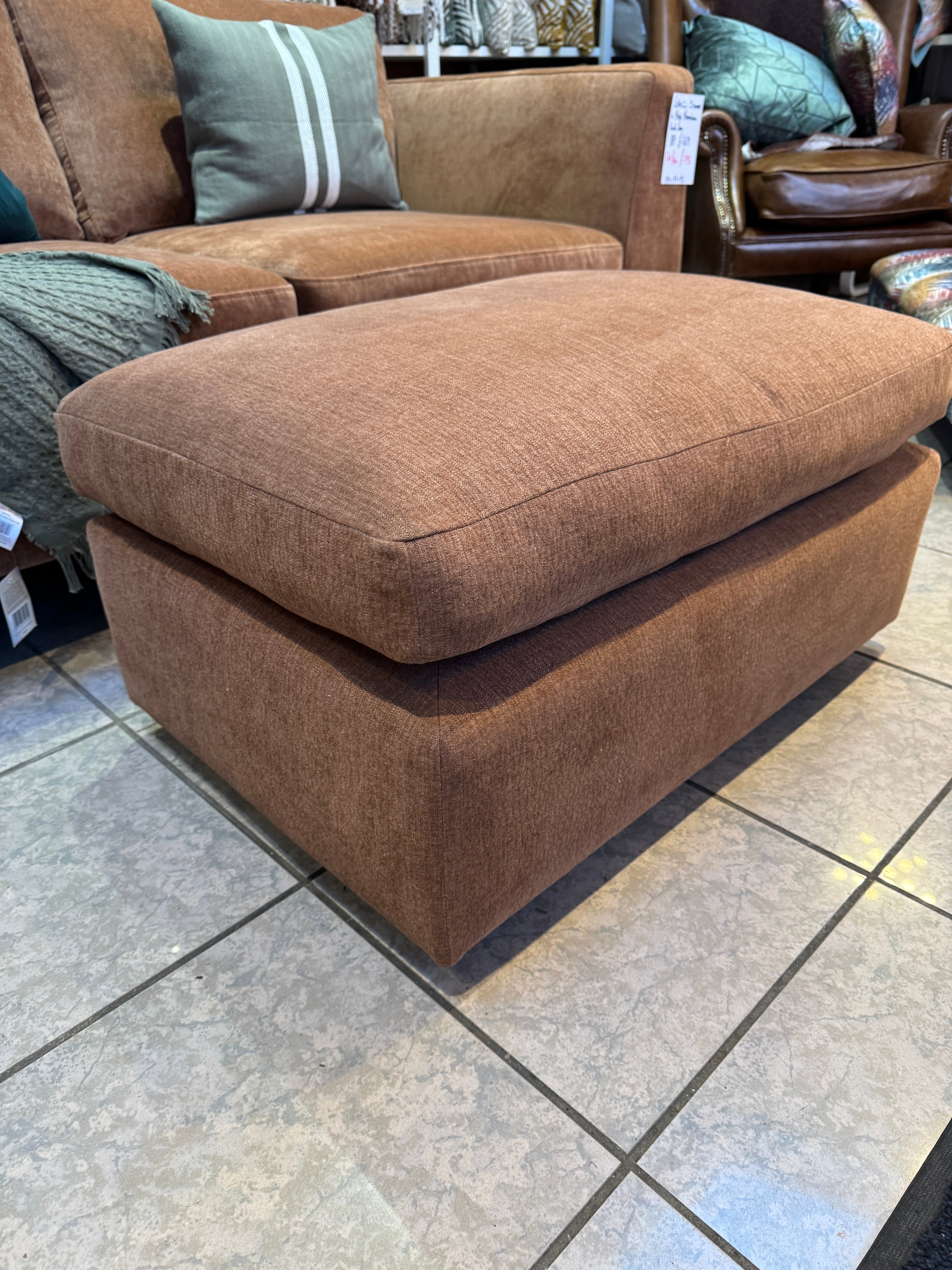 Designer rectangle padded top footstool in rust cotton fabric