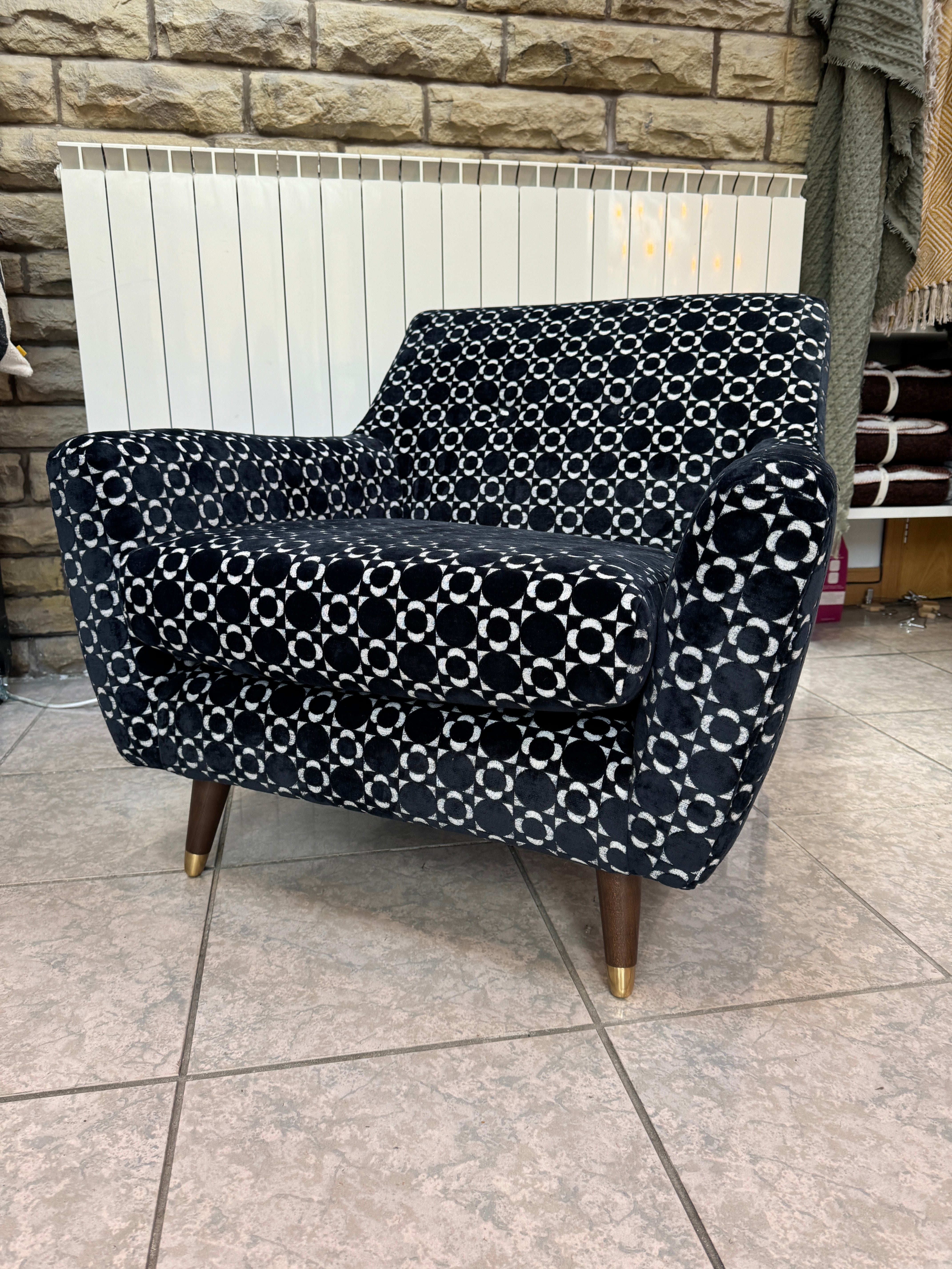 Orla Kiely Rose accent chair in retro tile black velvet fabric